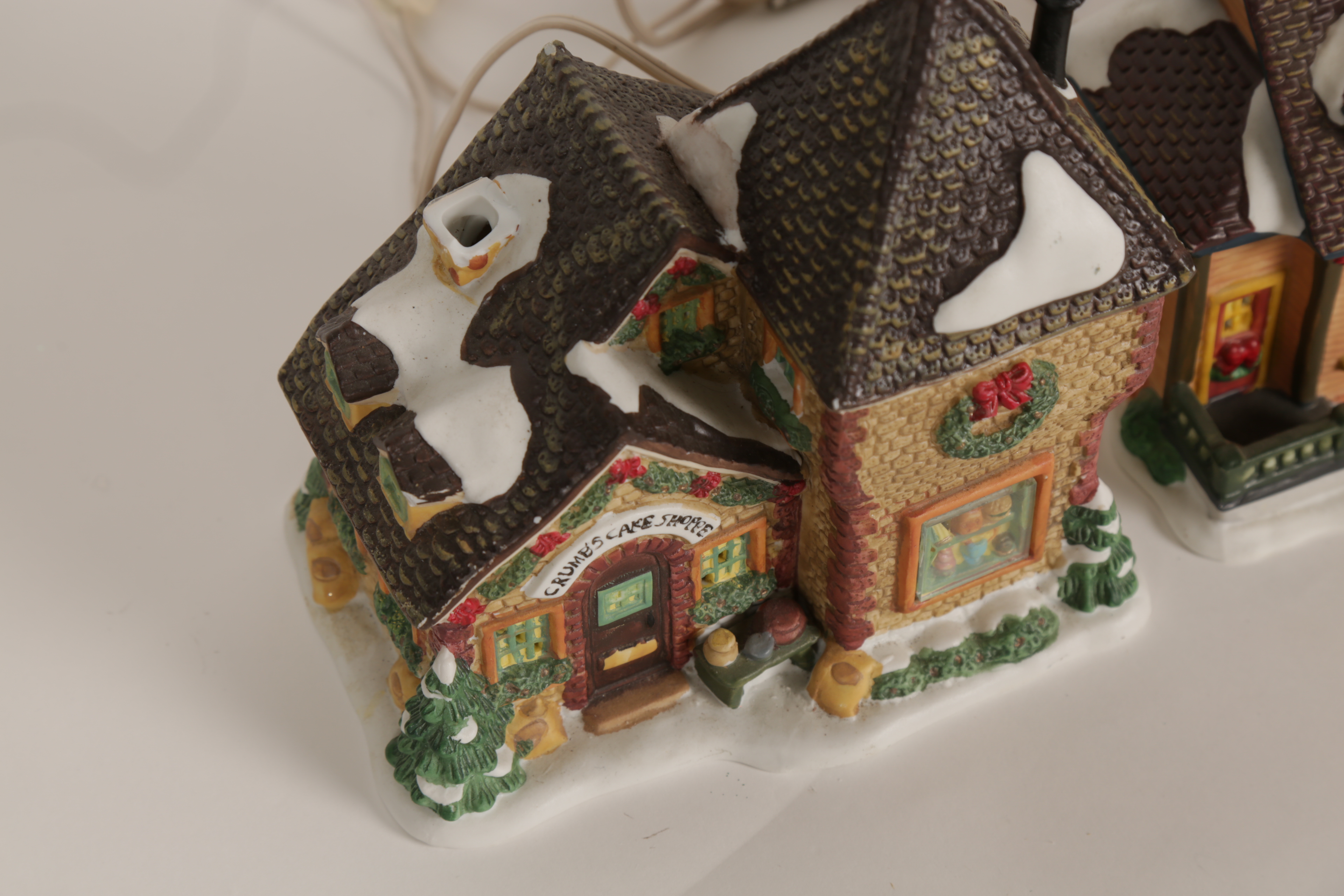 Collection of "Santa's Workbench Collection" Illuminated Houses