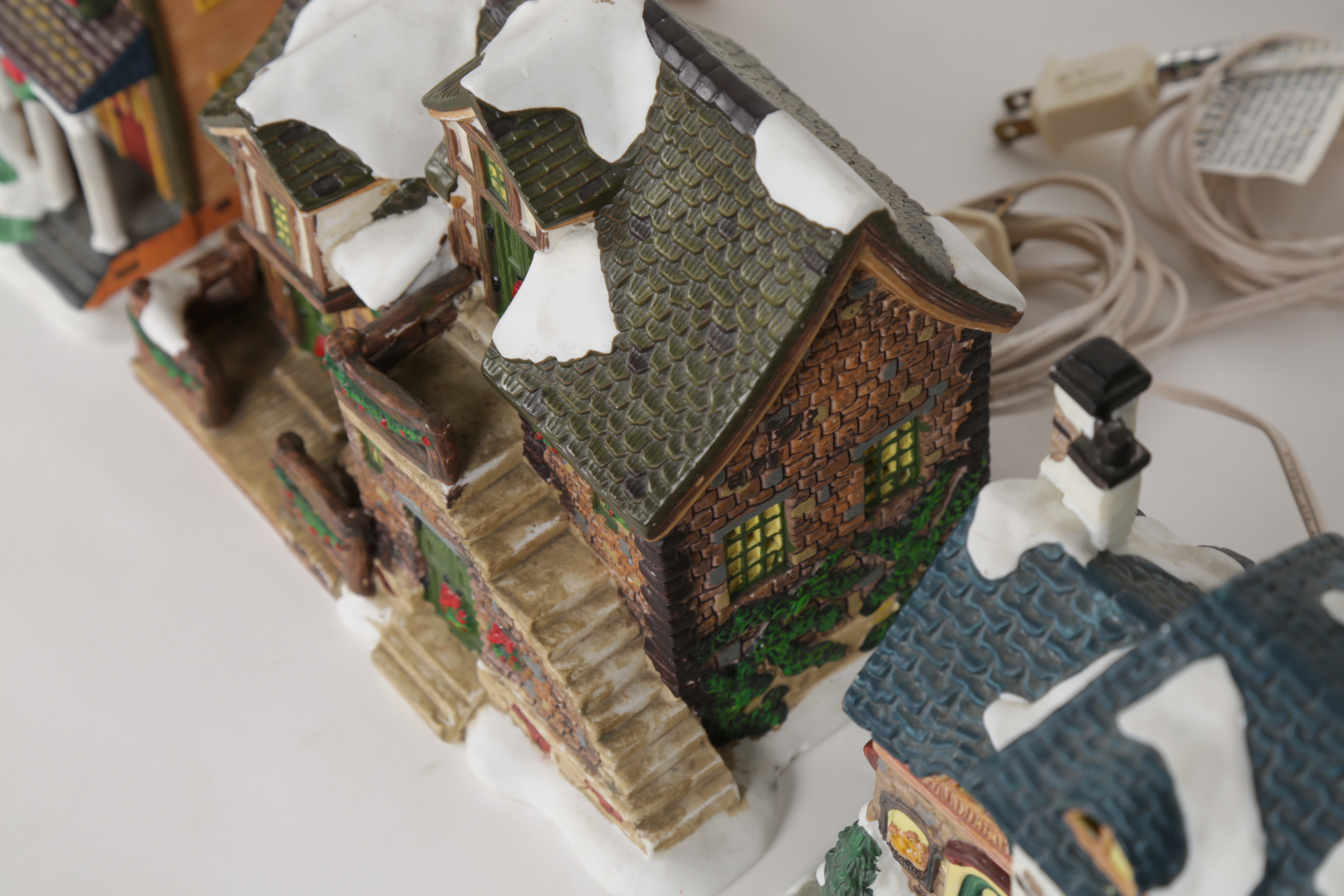 Collection of "Santa's Workbench Collection" Illuminated Houses