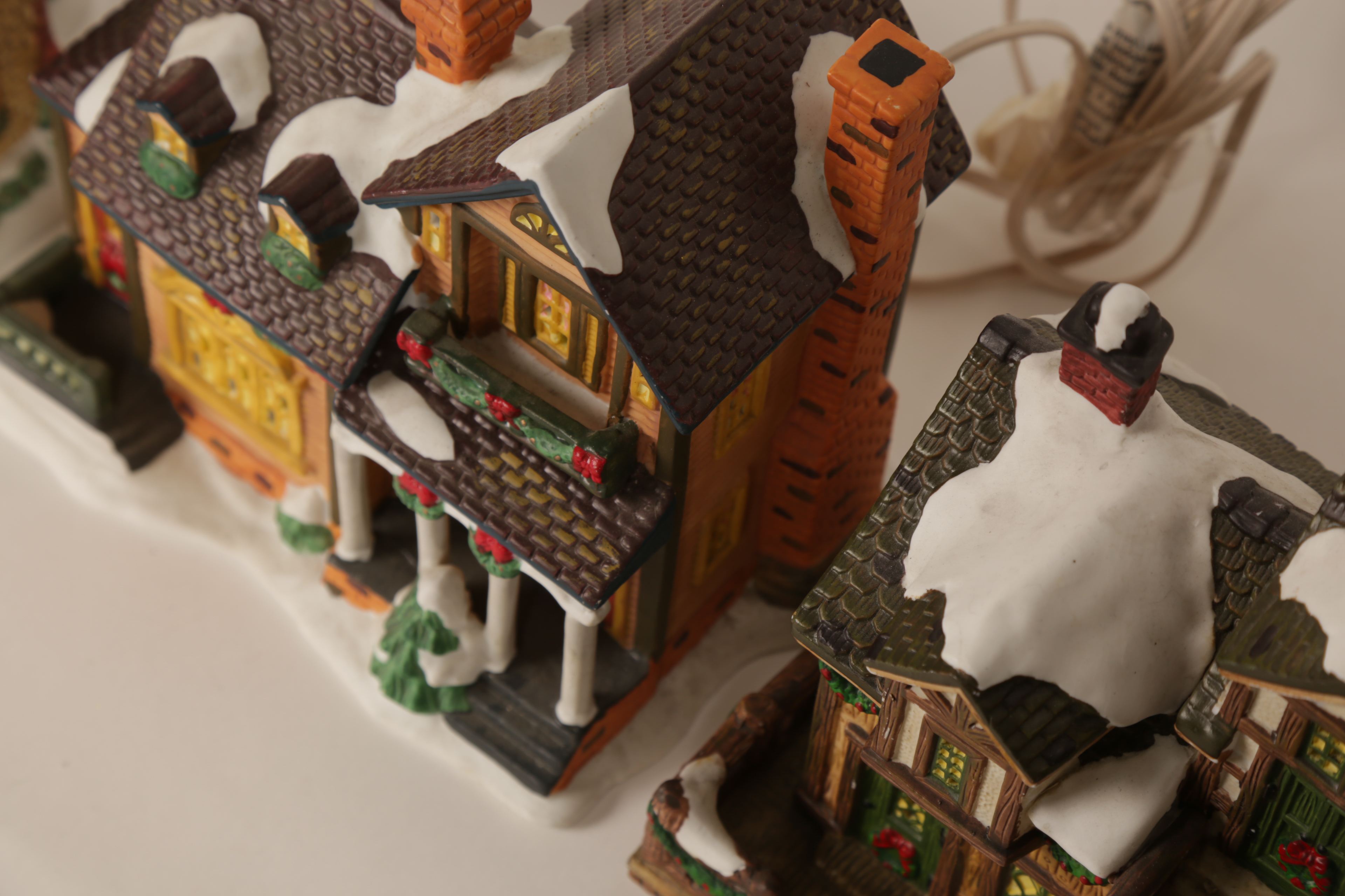 Collection of "Santa's Workbench Collection" Illuminated Houses