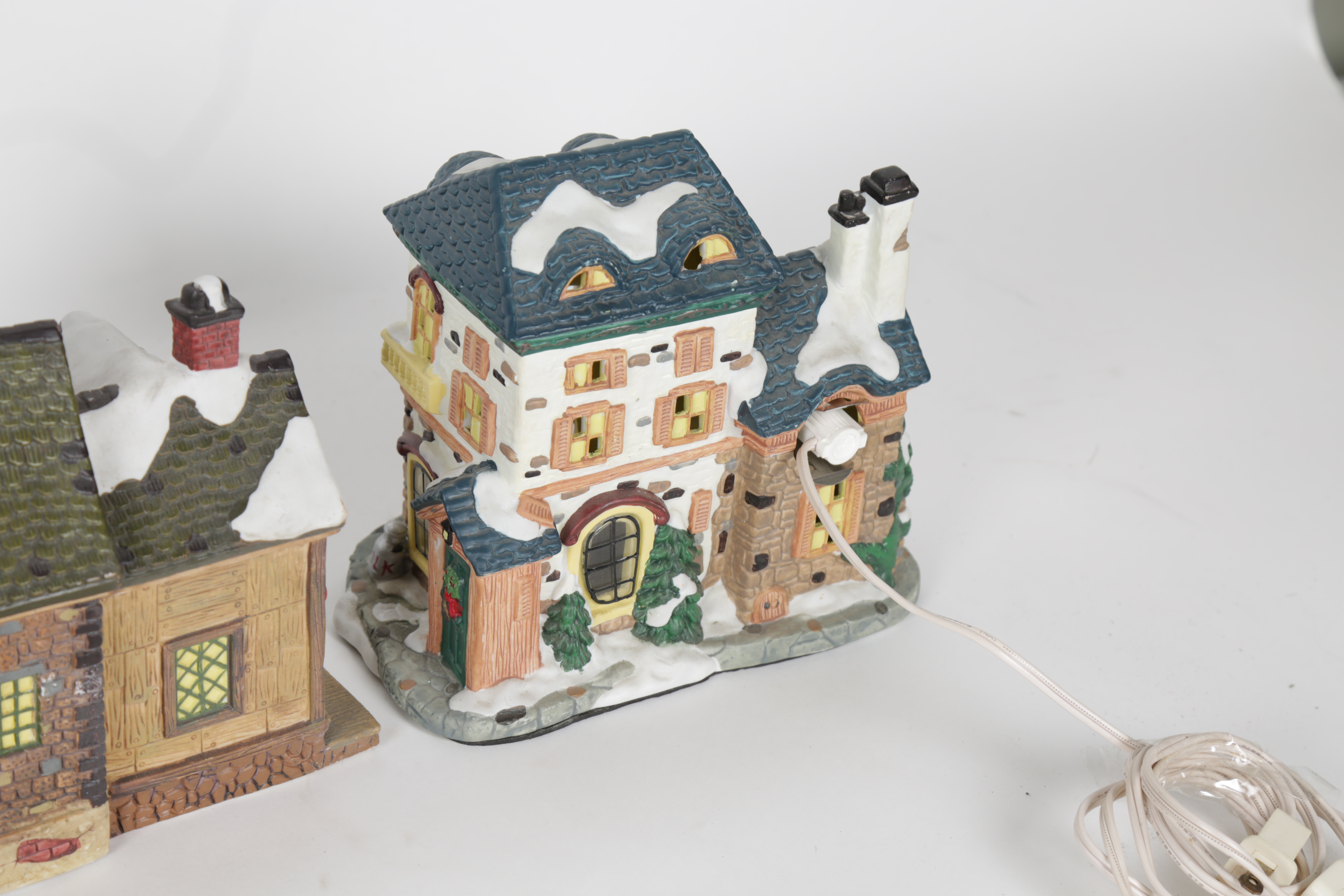 Collection of "Santa's Workbench Collection" Illuminated Houses