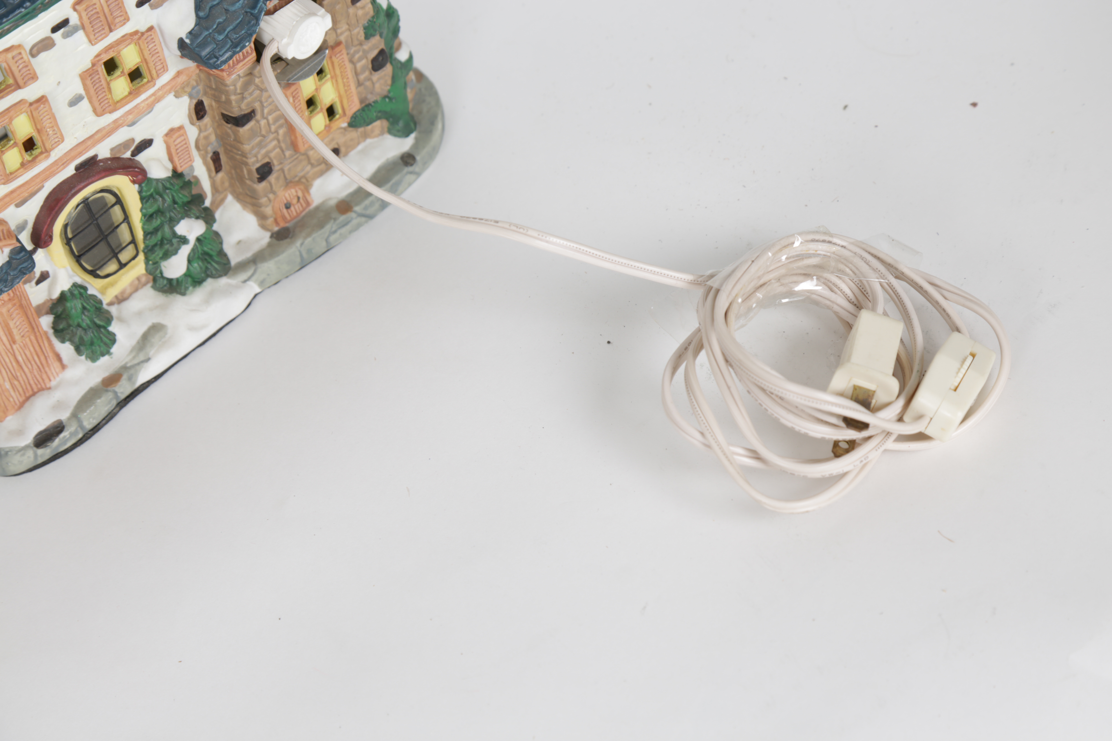 Collection of "Santa's Workbench Collection" Illuminated Houses