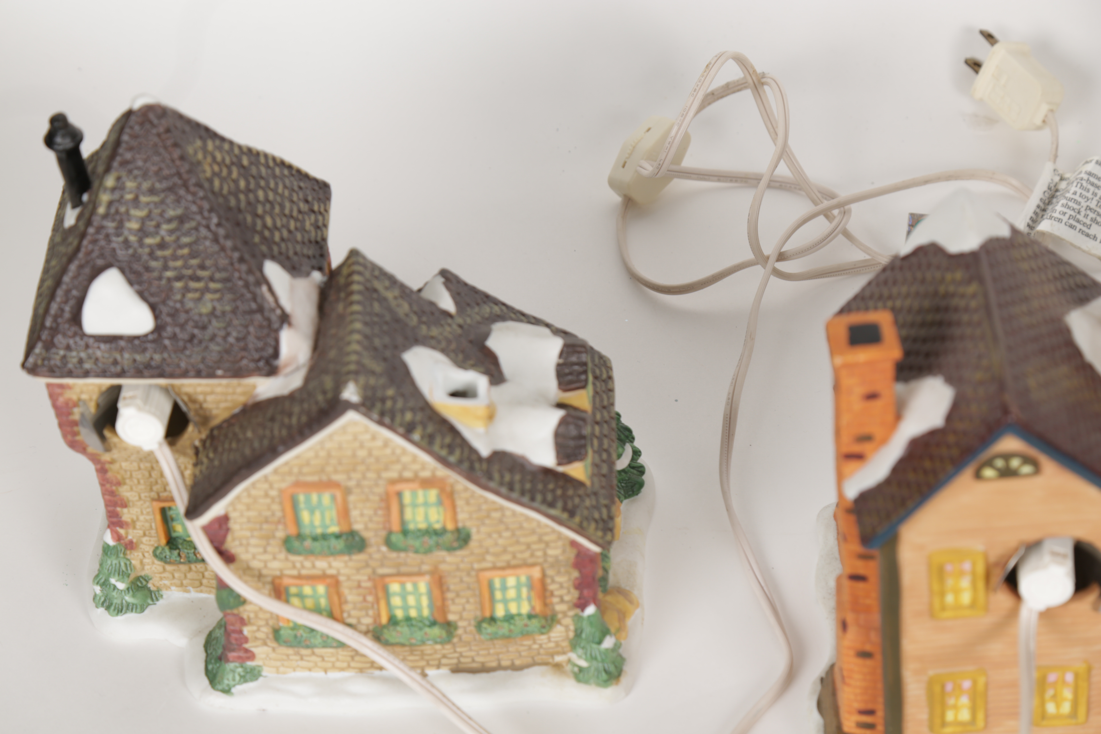 Collection of "Santa's Workbench Collection" Illuminated Houses