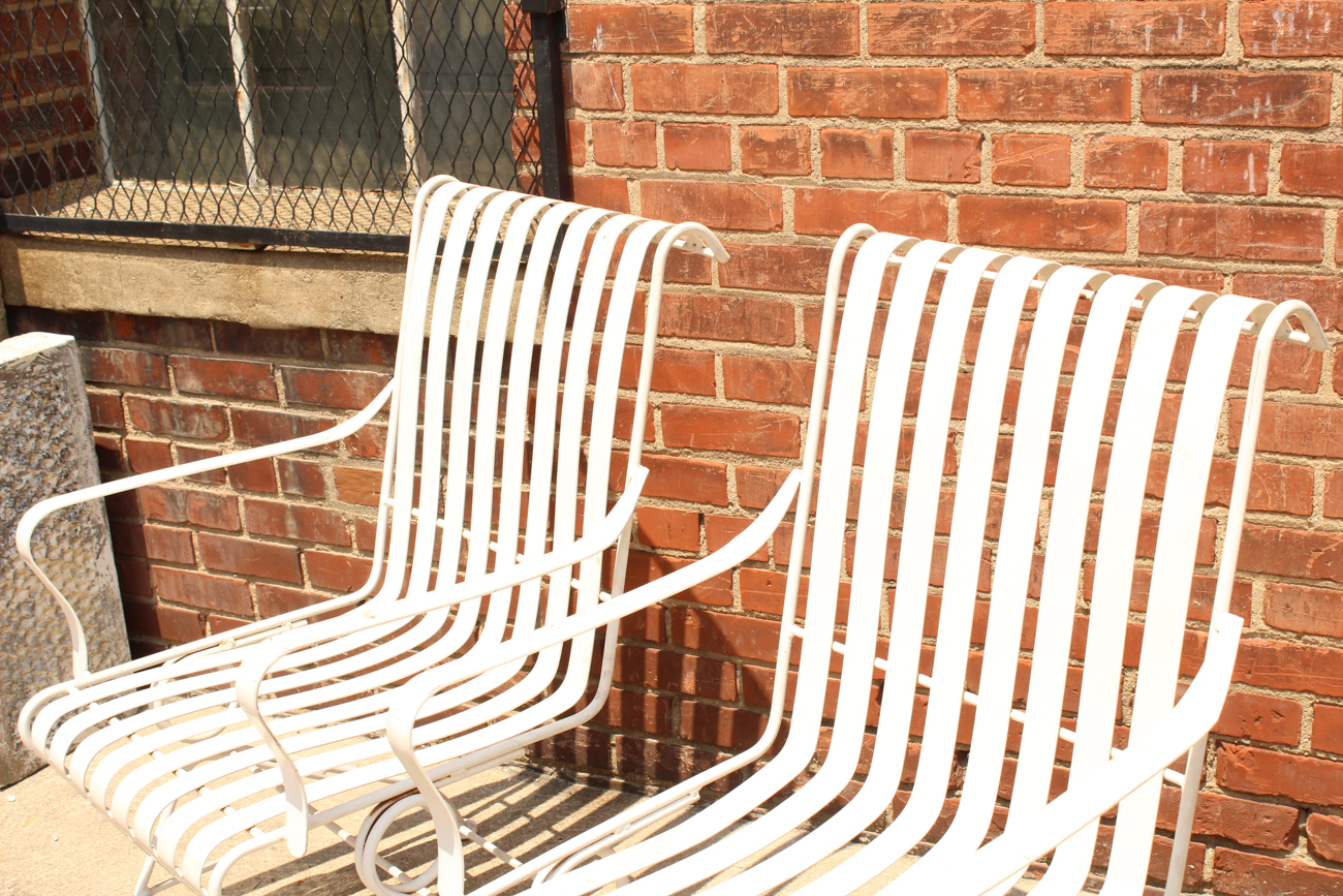 Pair of White Metal Outdoor Rocking Chairs