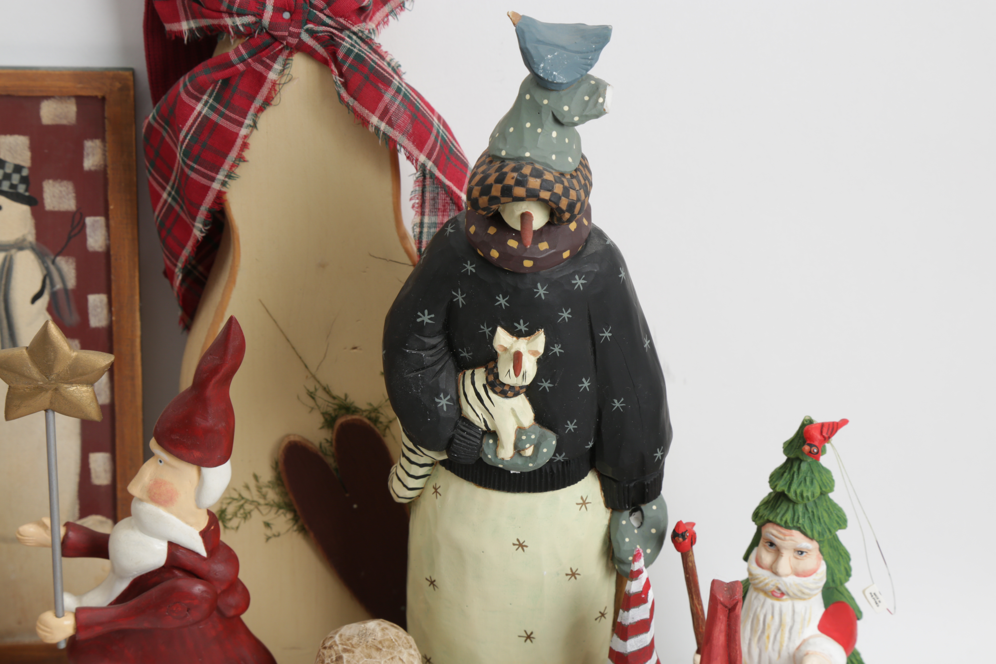 Assortment of Hand Painted Wood Santa and Snowman Carvings