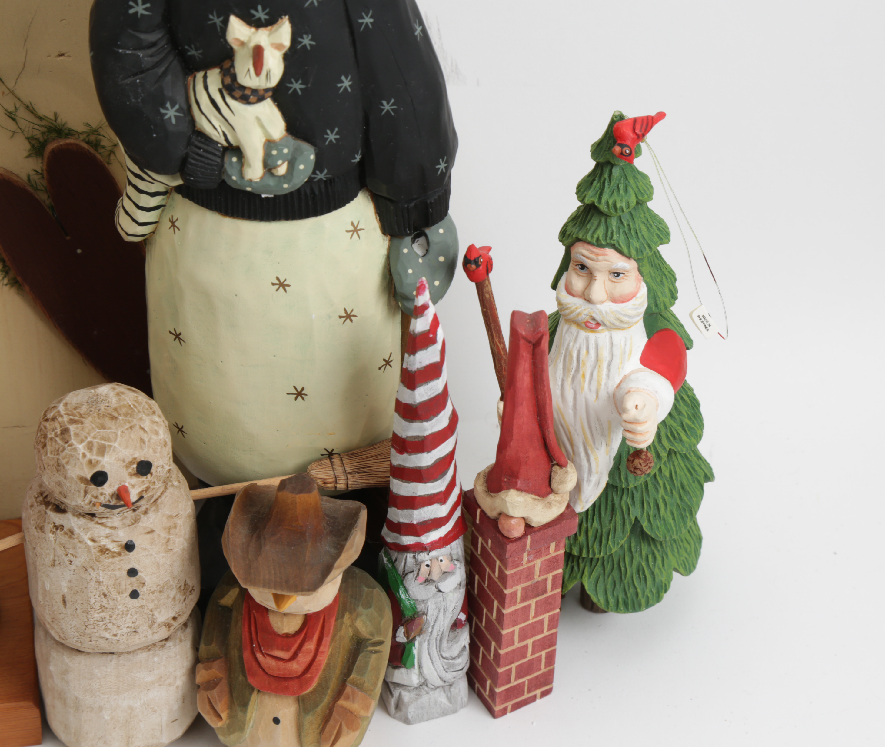 Assortment of Hand Painted Wood Santa and Snowman Carvings