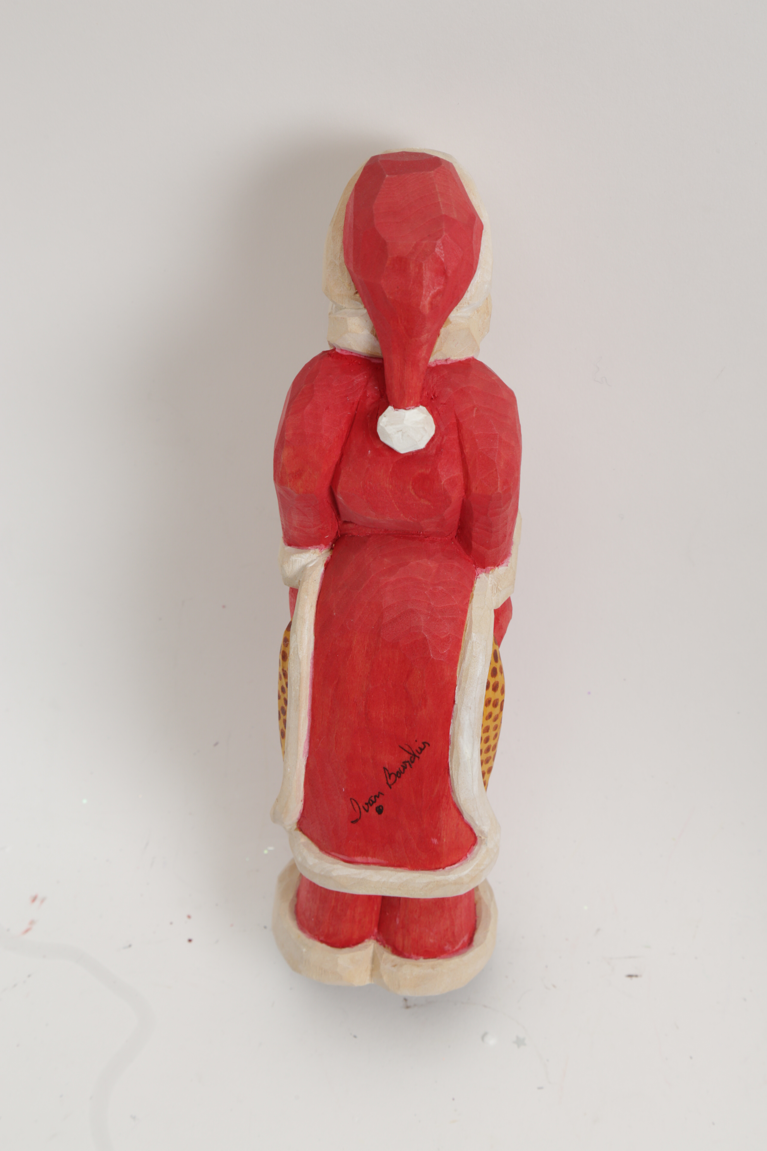 Assortment of Hand Painted Wood Santa and Snowman Carvings