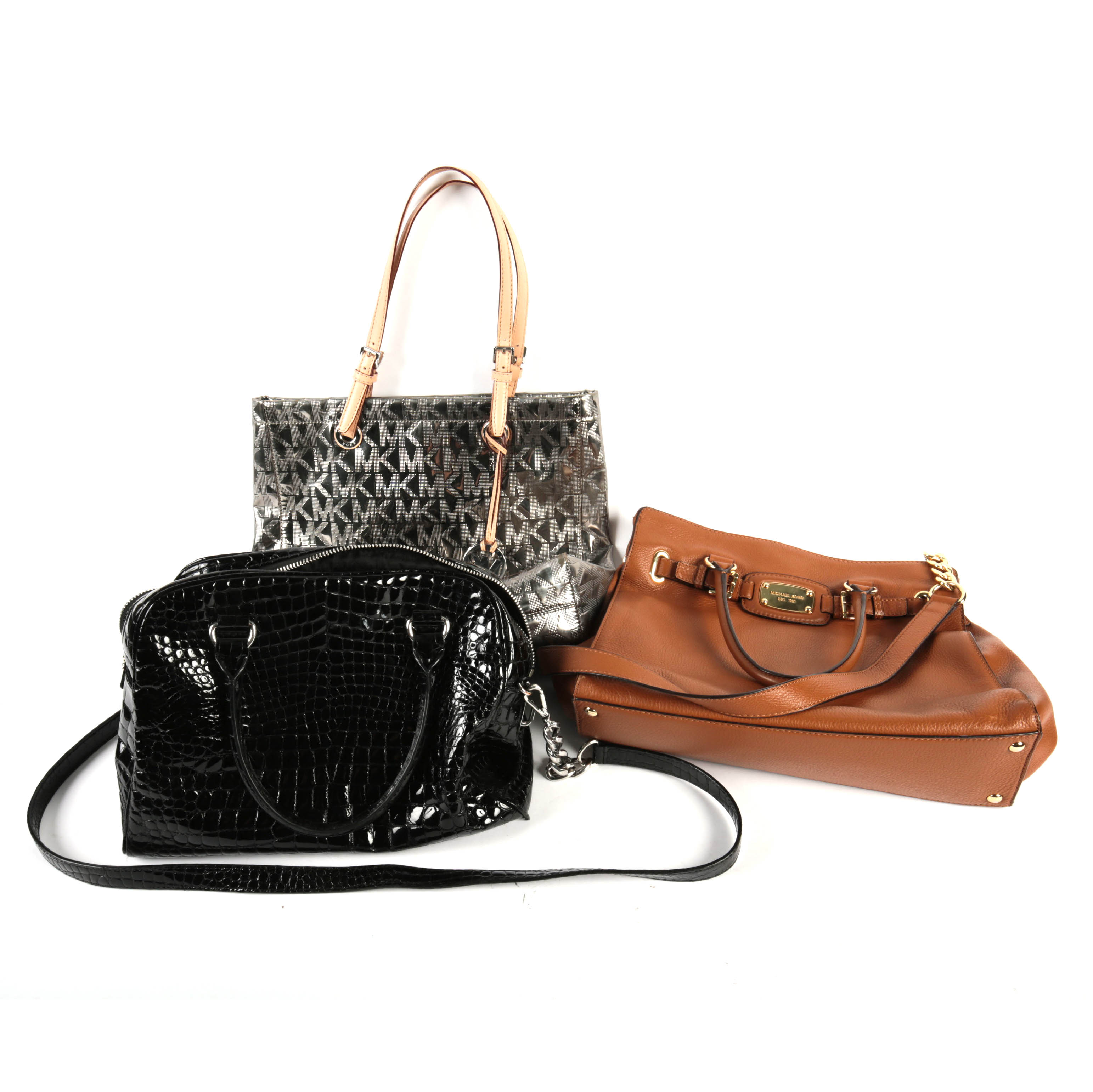 Three Michael Kors Handbags