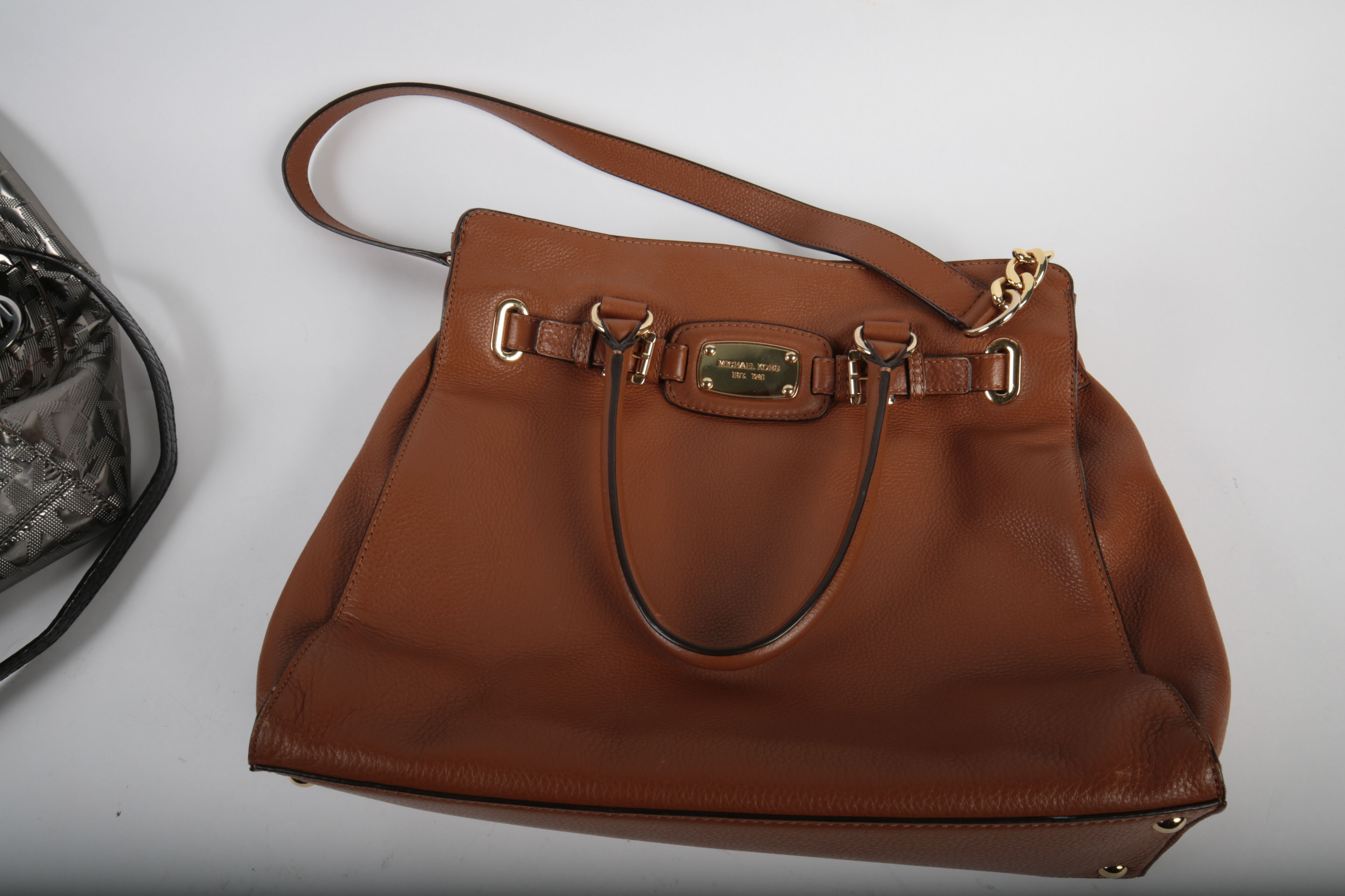 Three Michael Kors Handbags