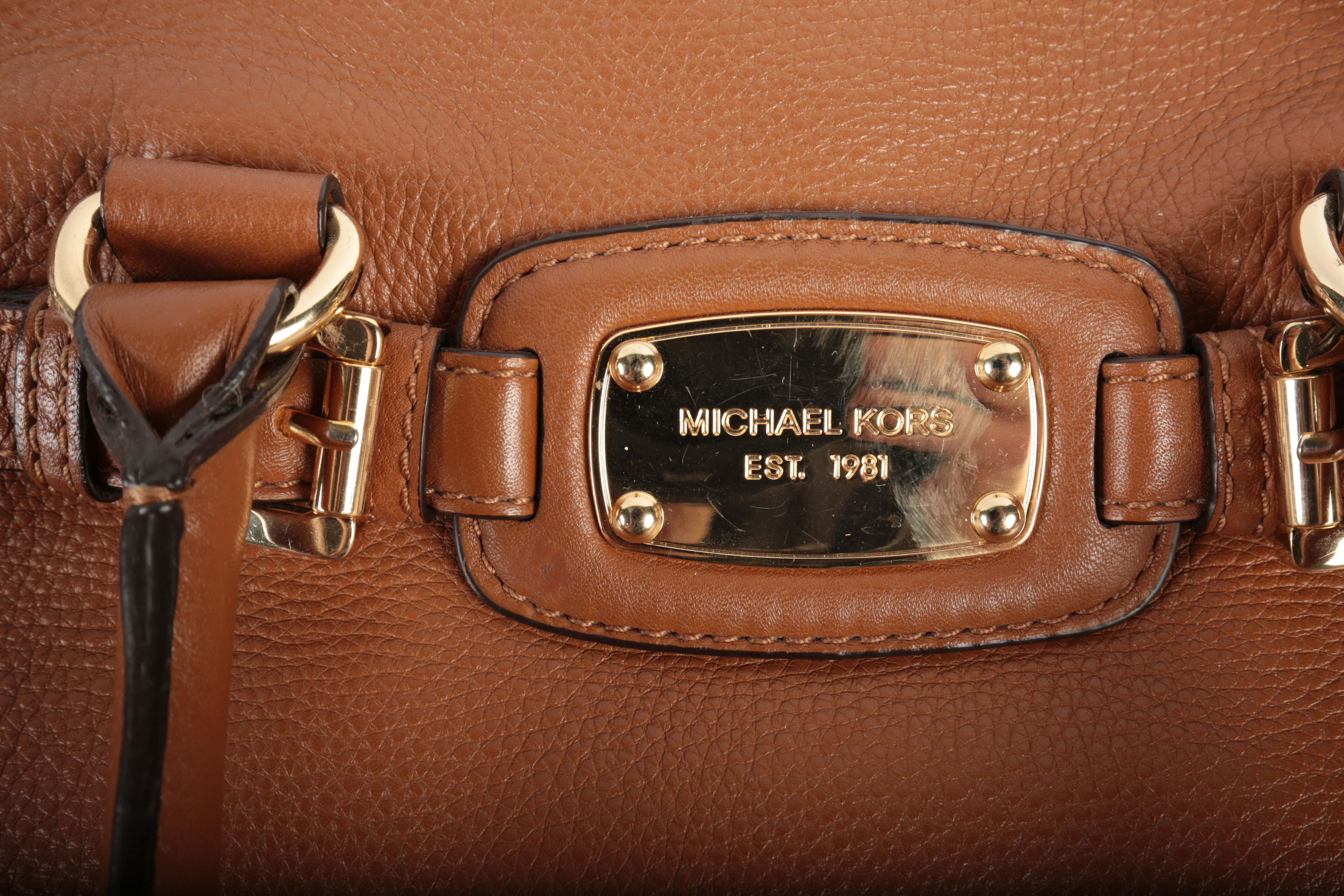 Three Michael Kors Handbags