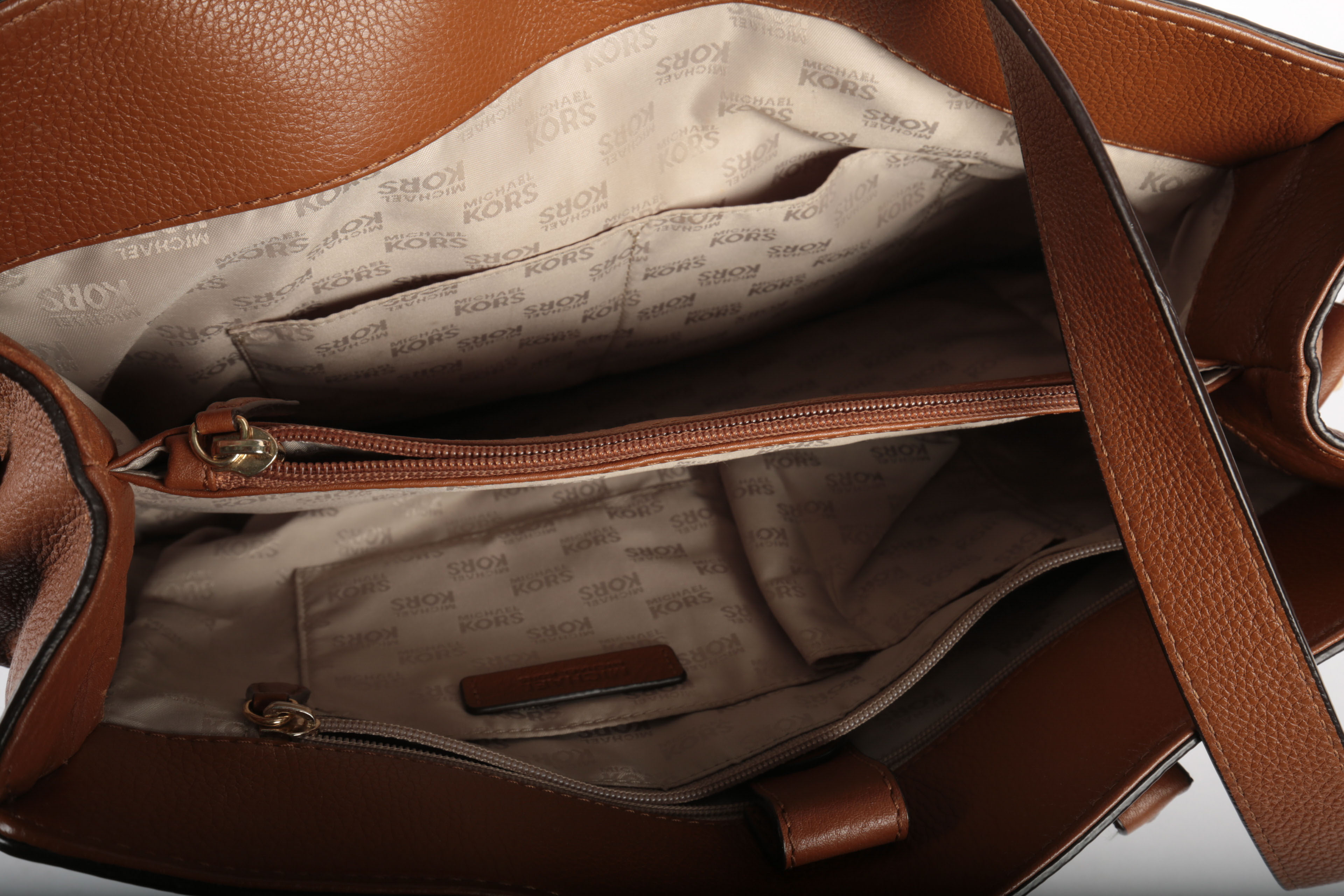 Three Michael Kors Handbags