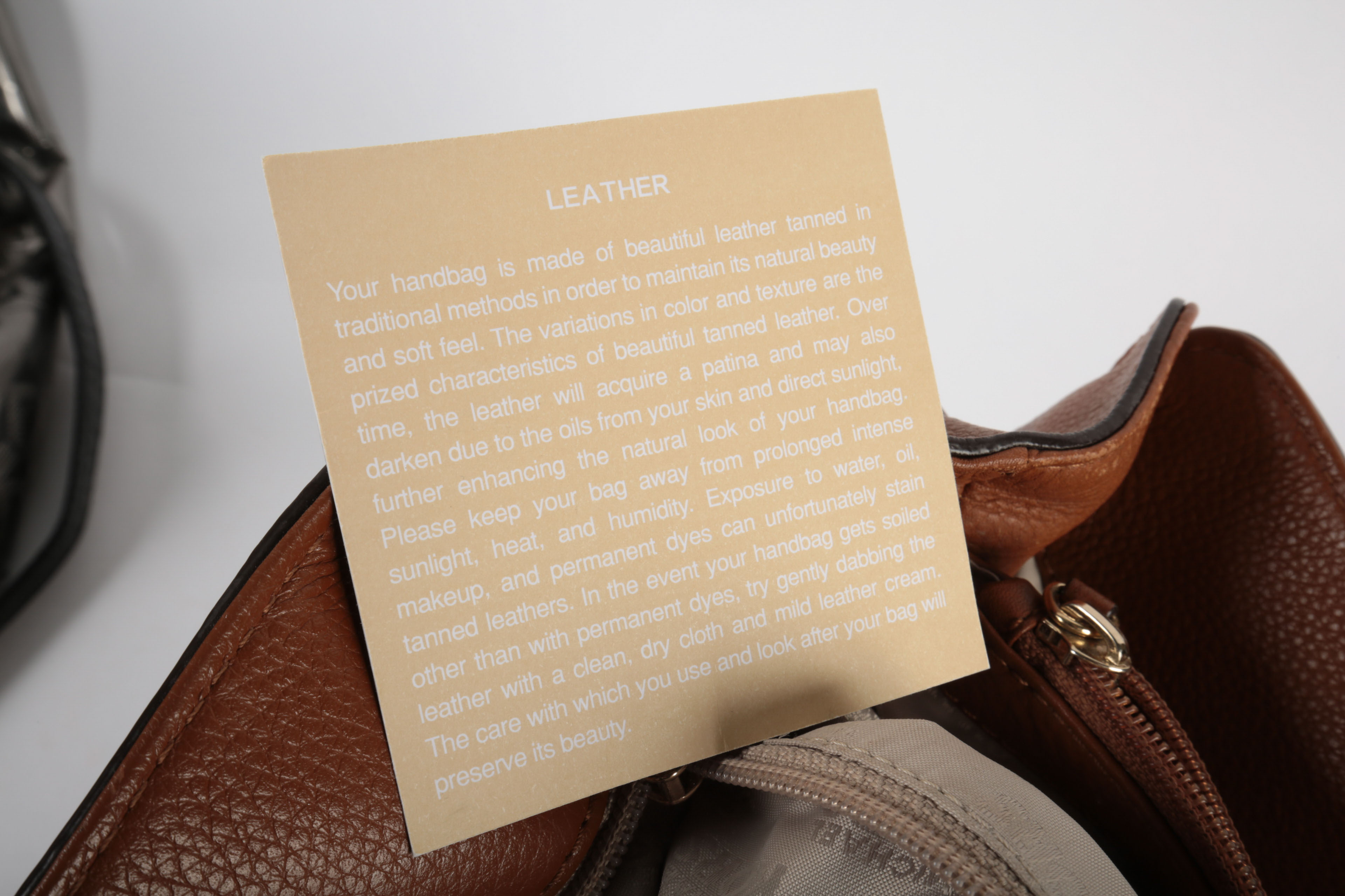 Three Michael Kors Handbags