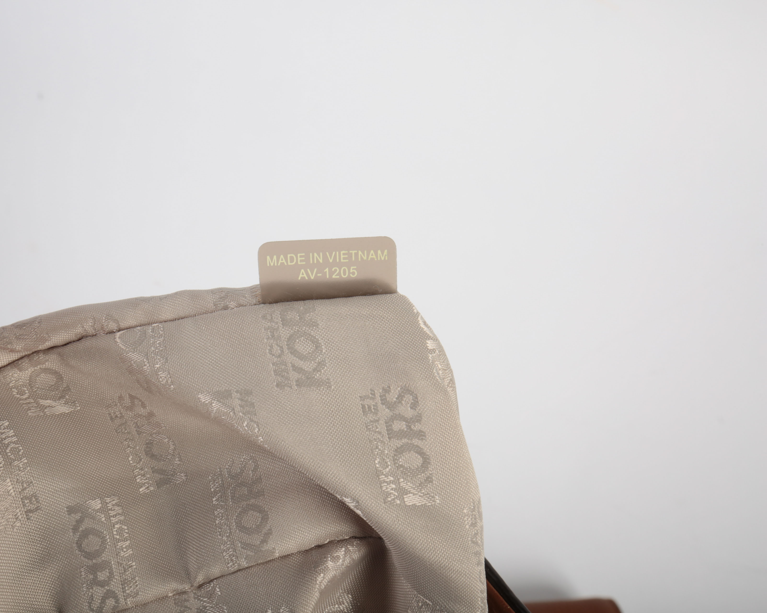 Three Michael Kors Handbags