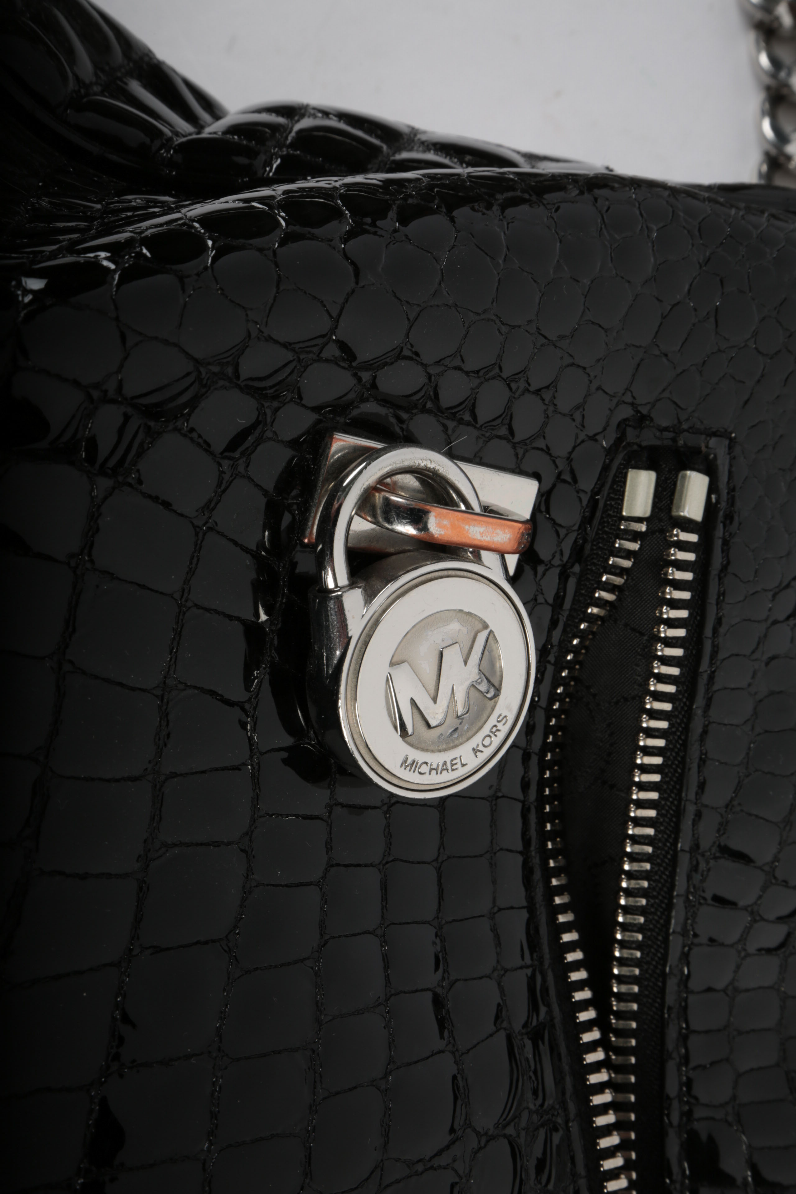 Three Michael Kors Handbags