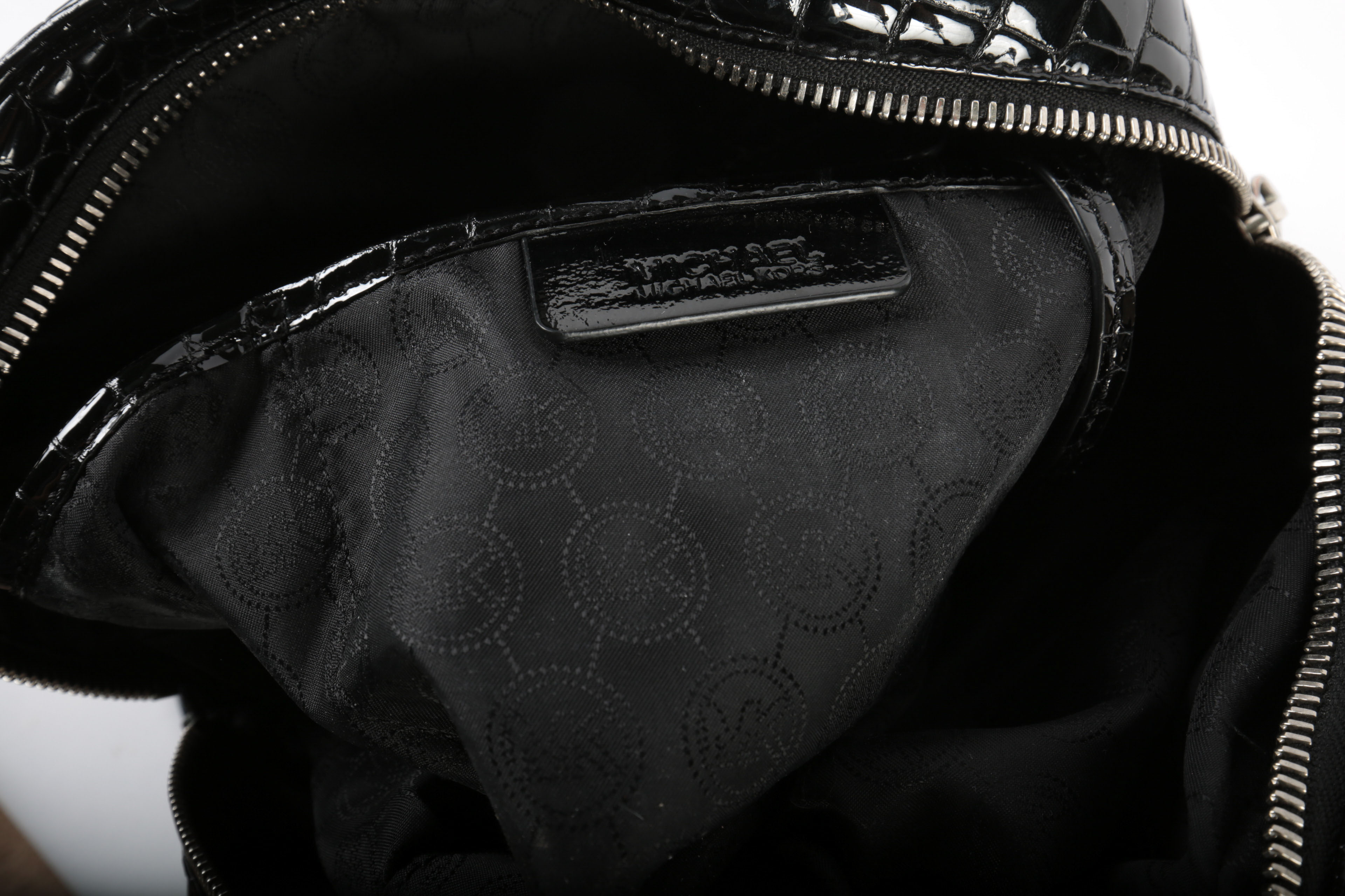 Three Michael Kors Handbags