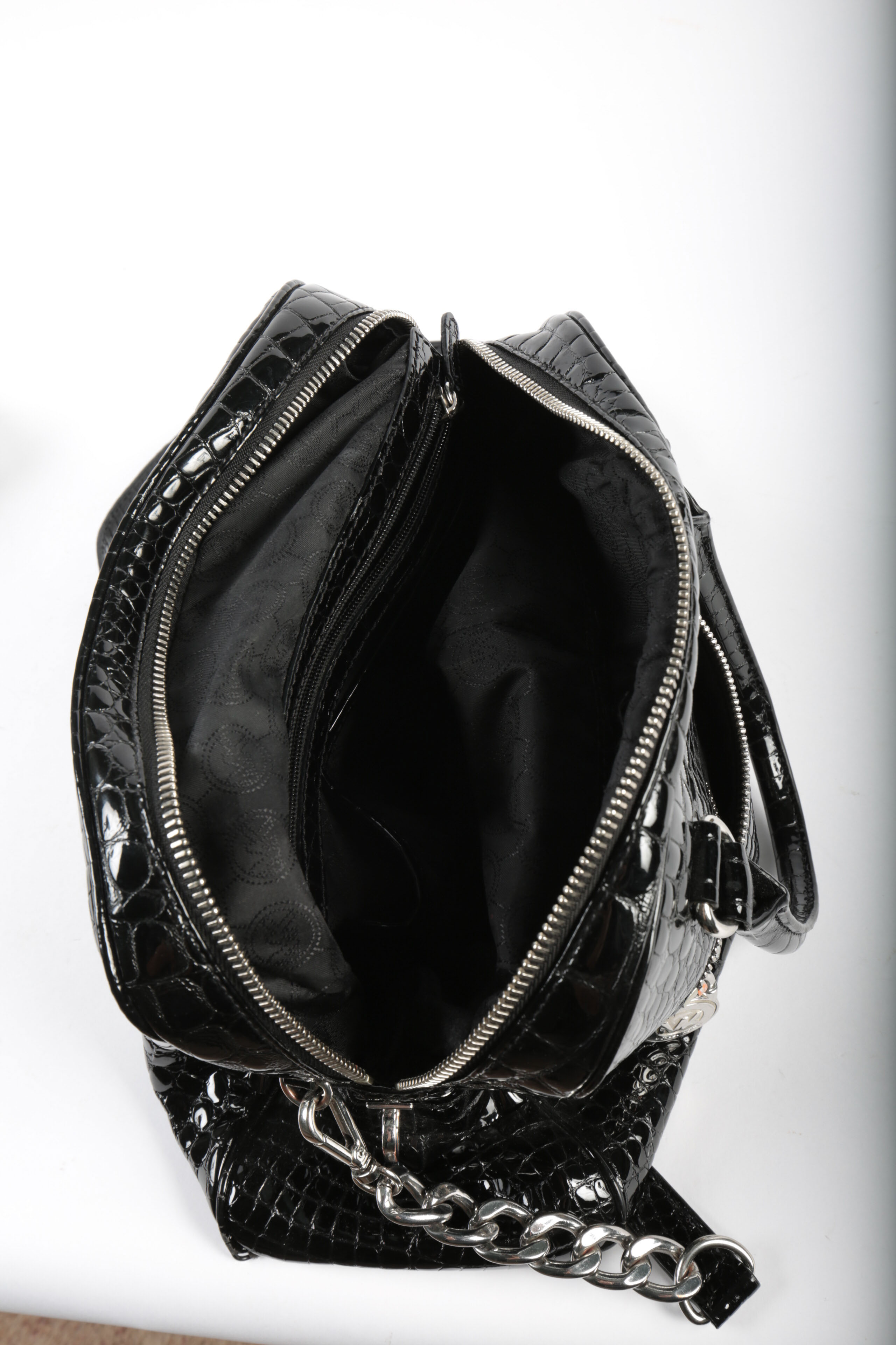 Three Michael Kors Handbags