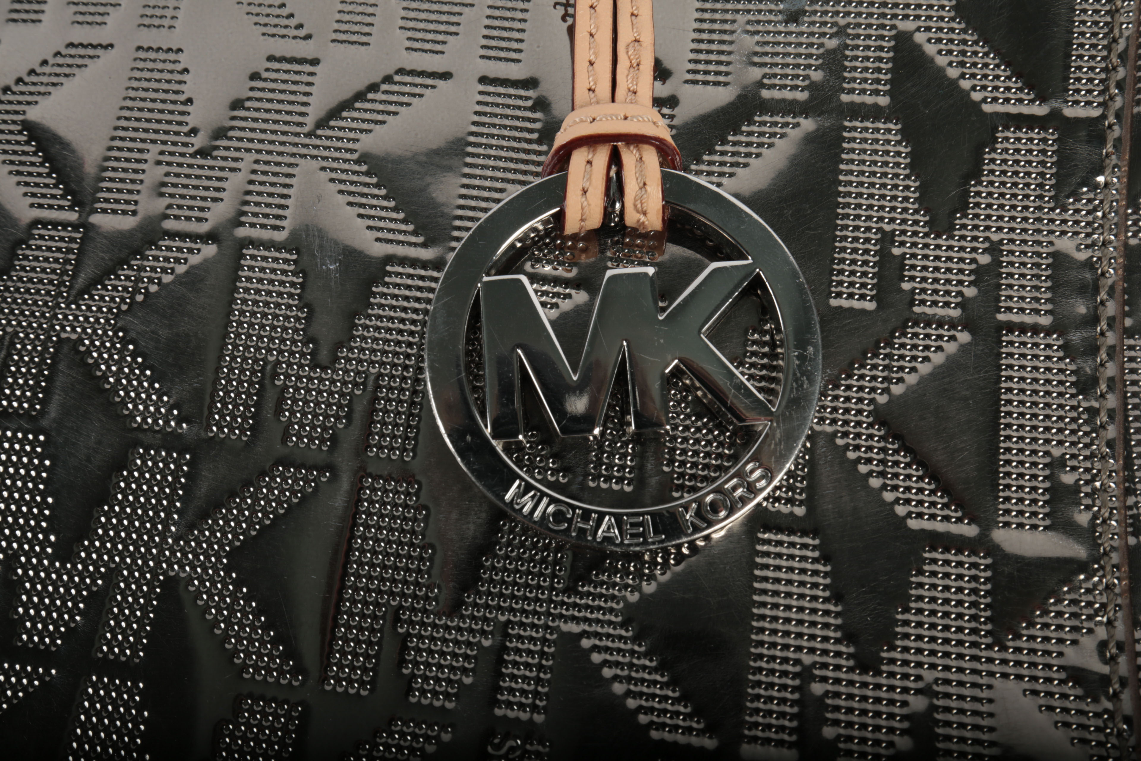 Three Michael Kors Handbags