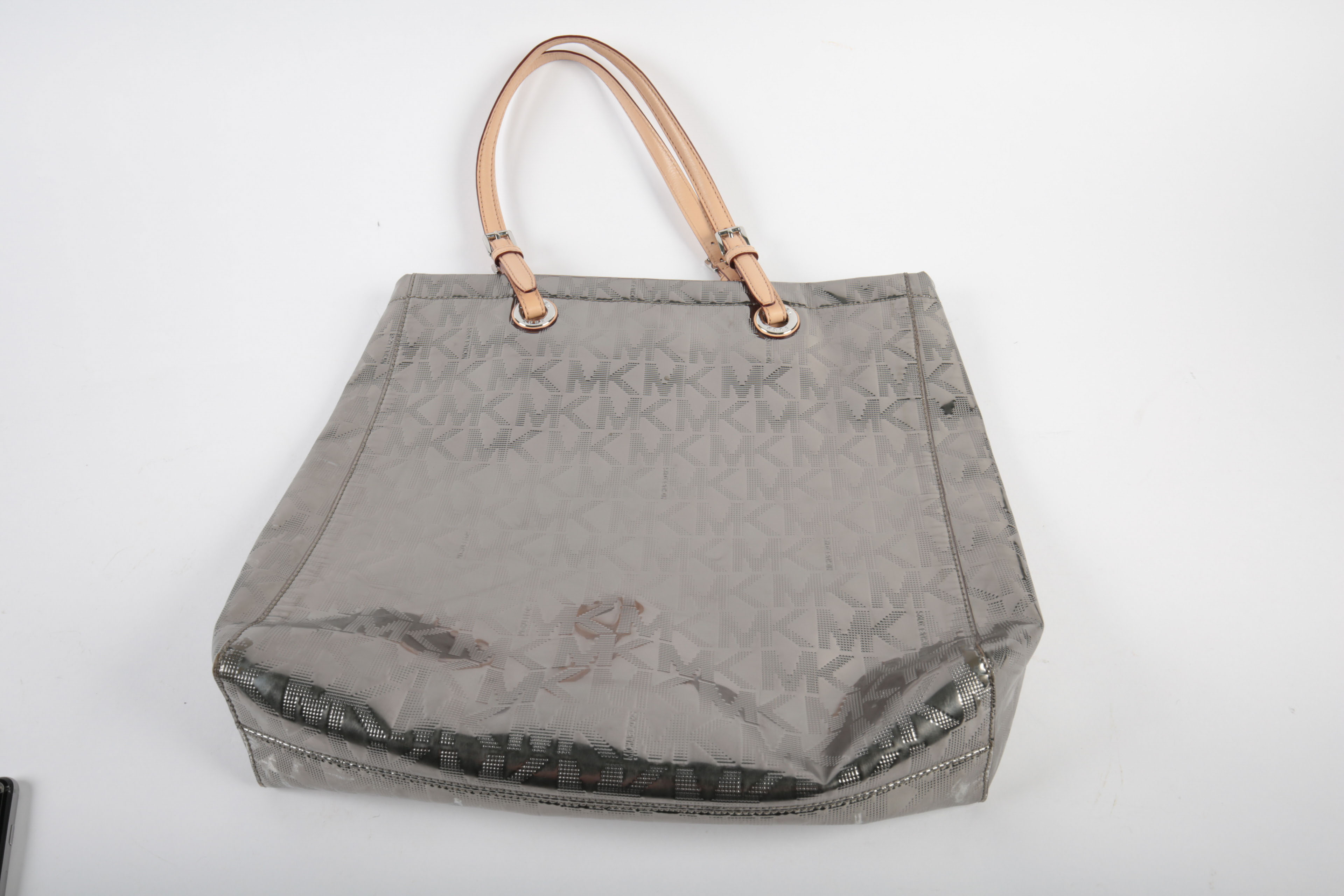 Three Michael Kors Handbags