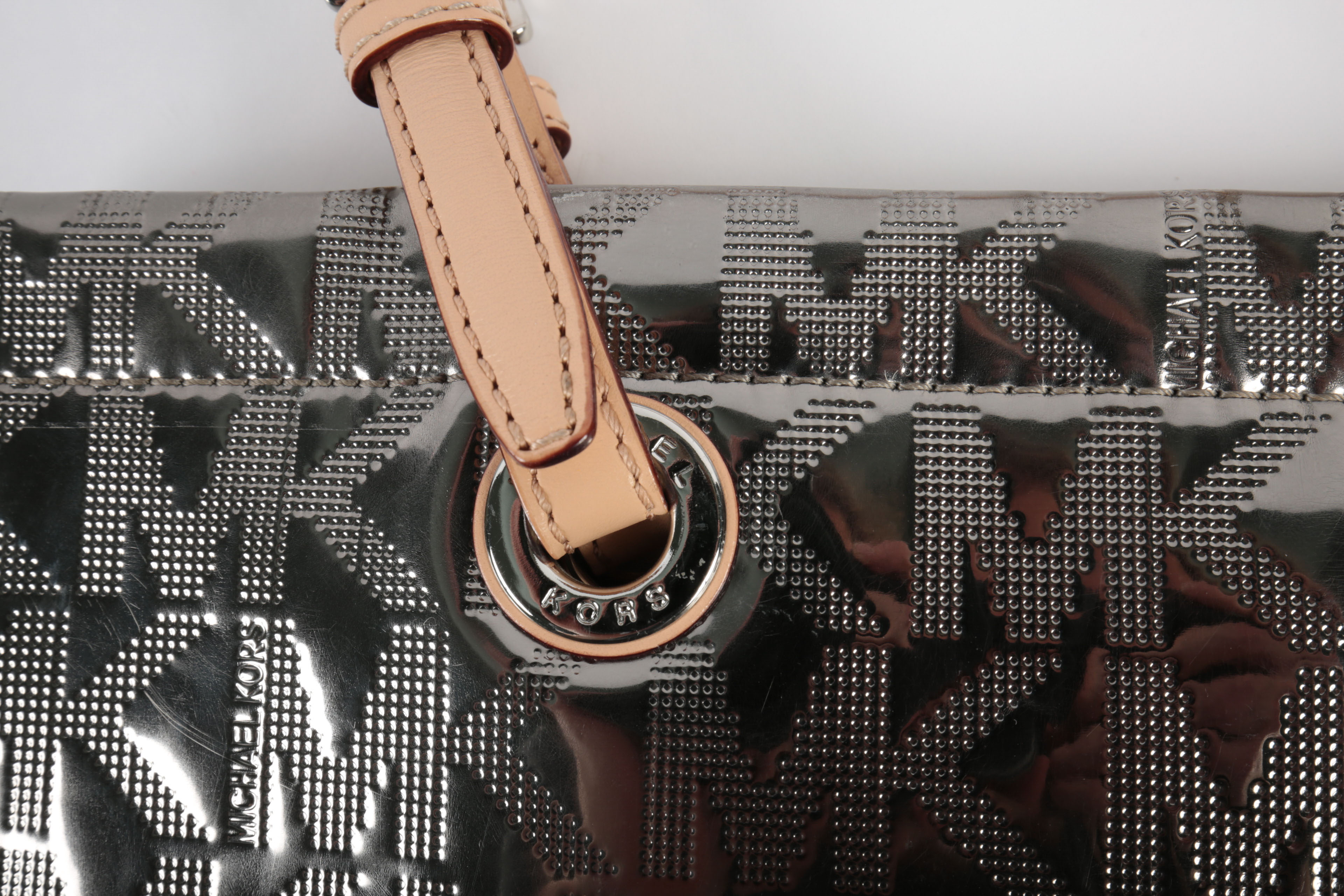 Three Michael Kors Handbags