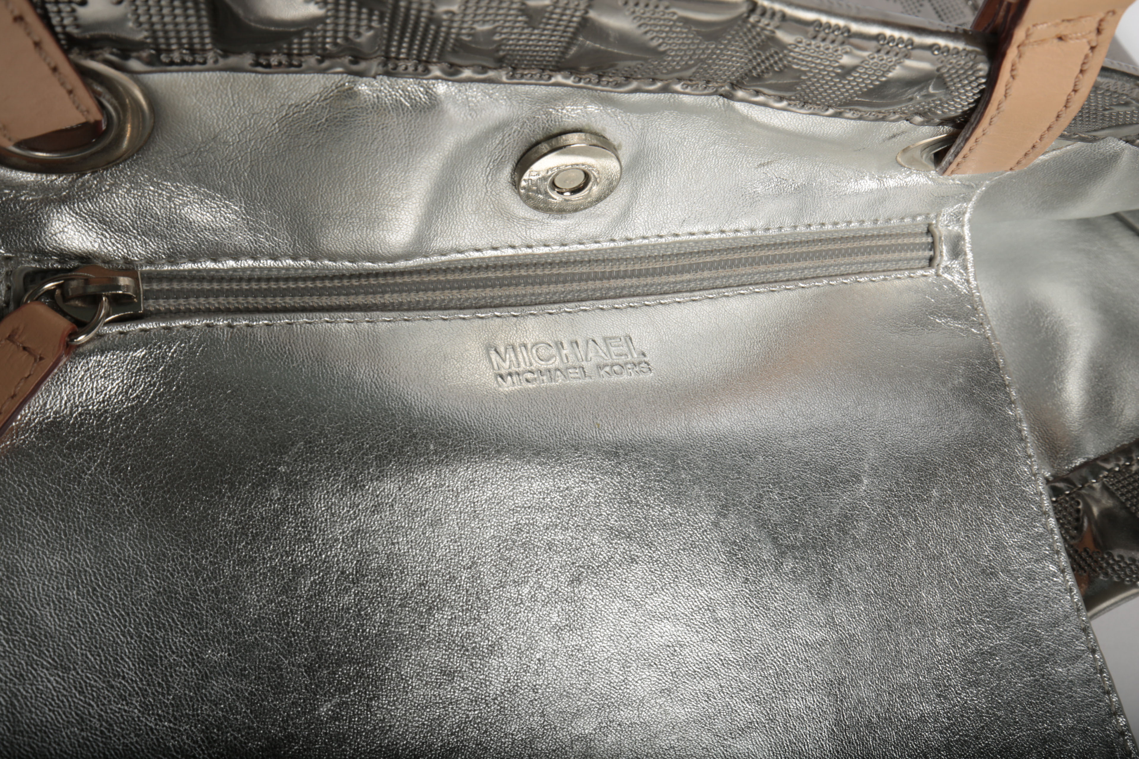 Three Michael Kors Handbags