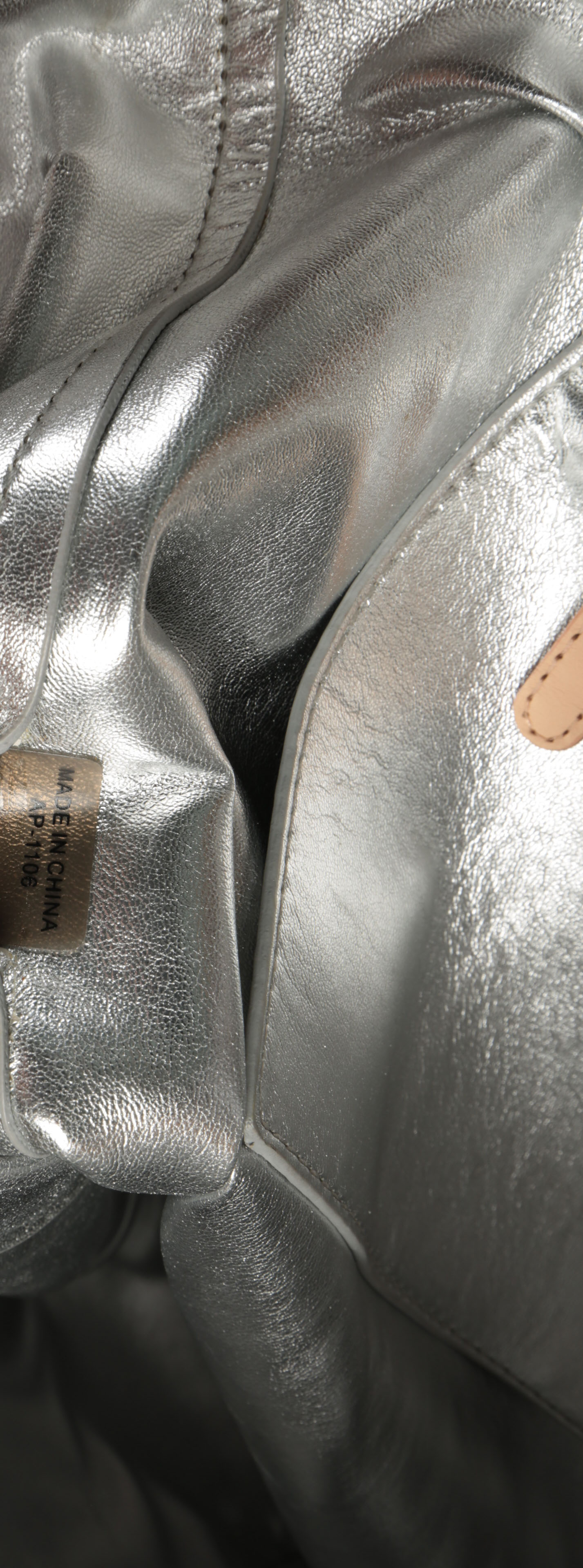 Three Michael Kors Handbags