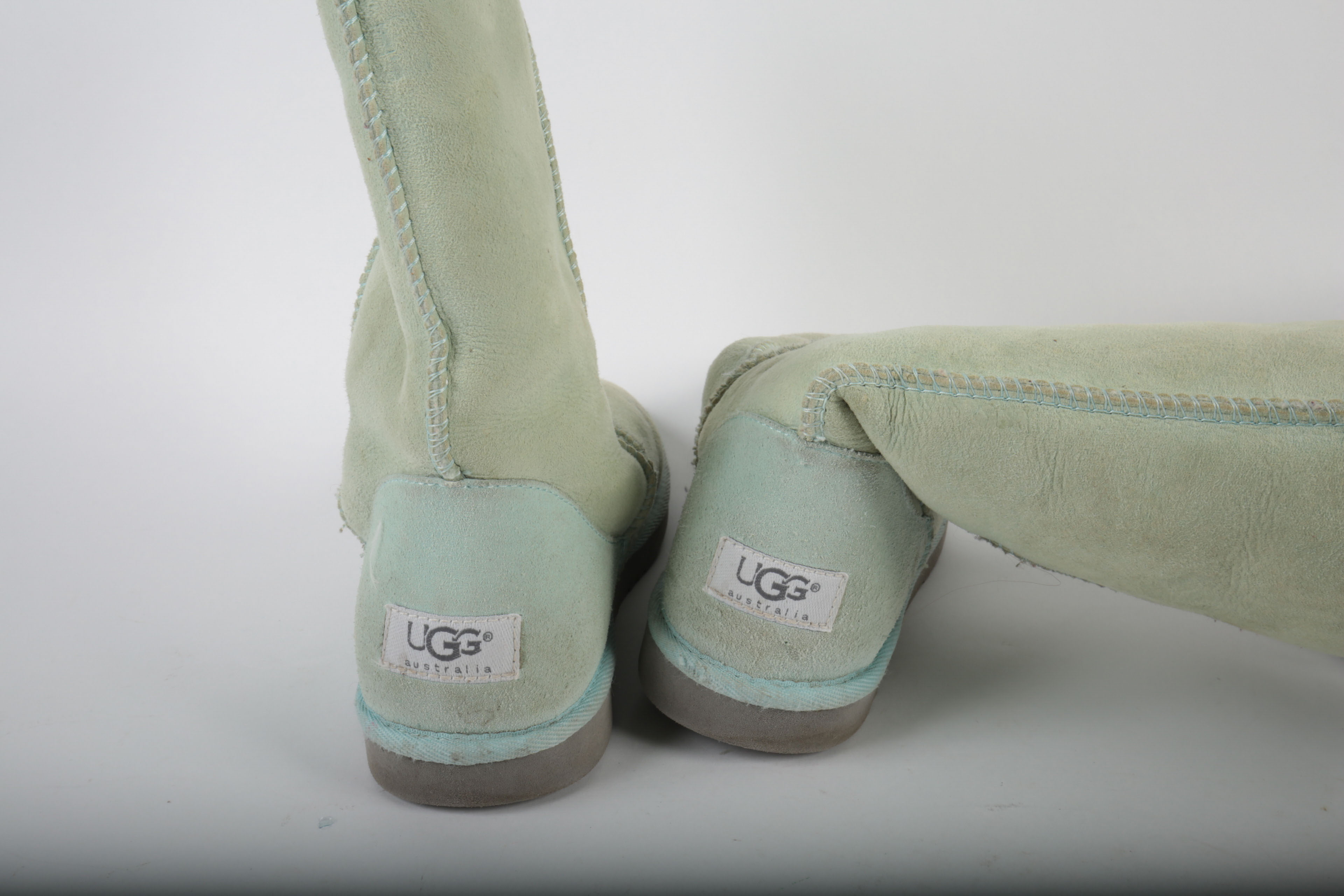 Three Pairs of UGG Shoes and Boots