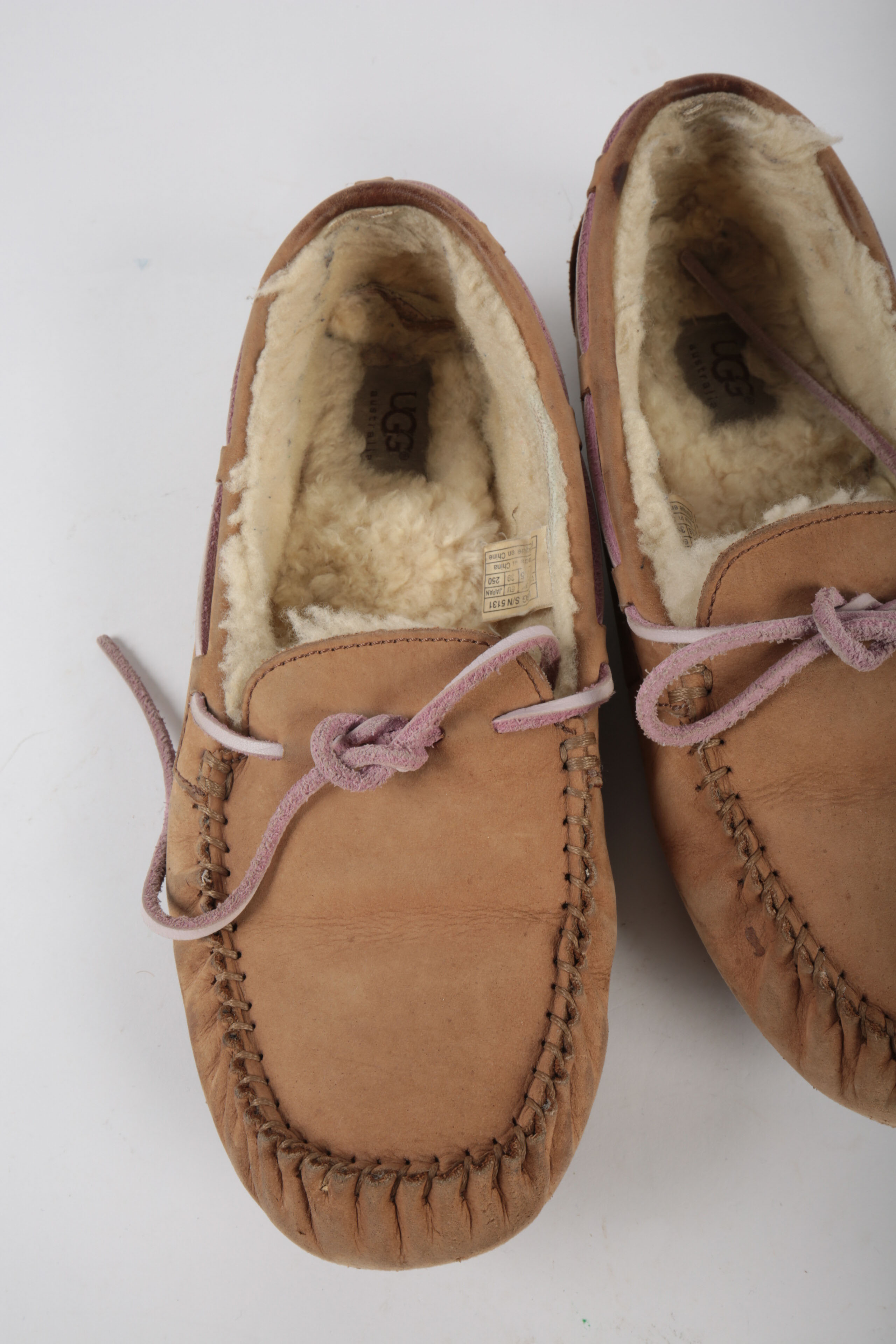 Three Pairs of UGG Shoes and Boots