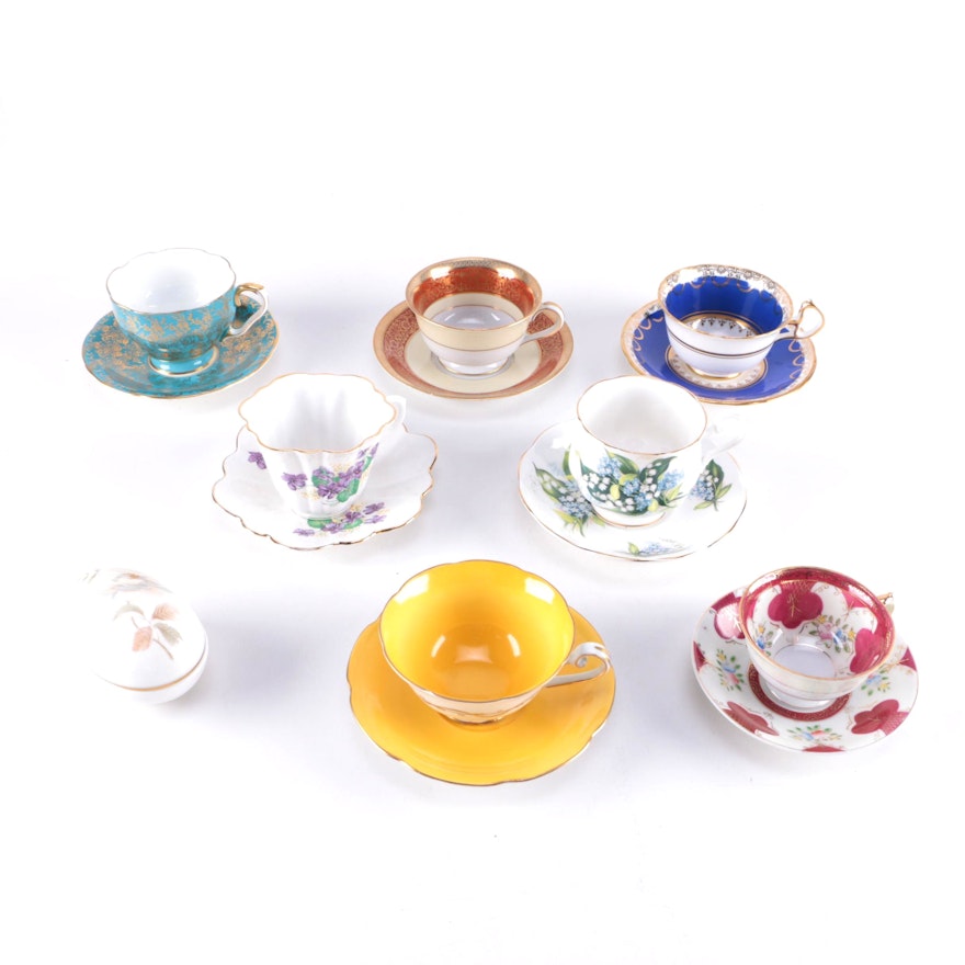 Collection of Bone China Teacups and Saucers and Egg