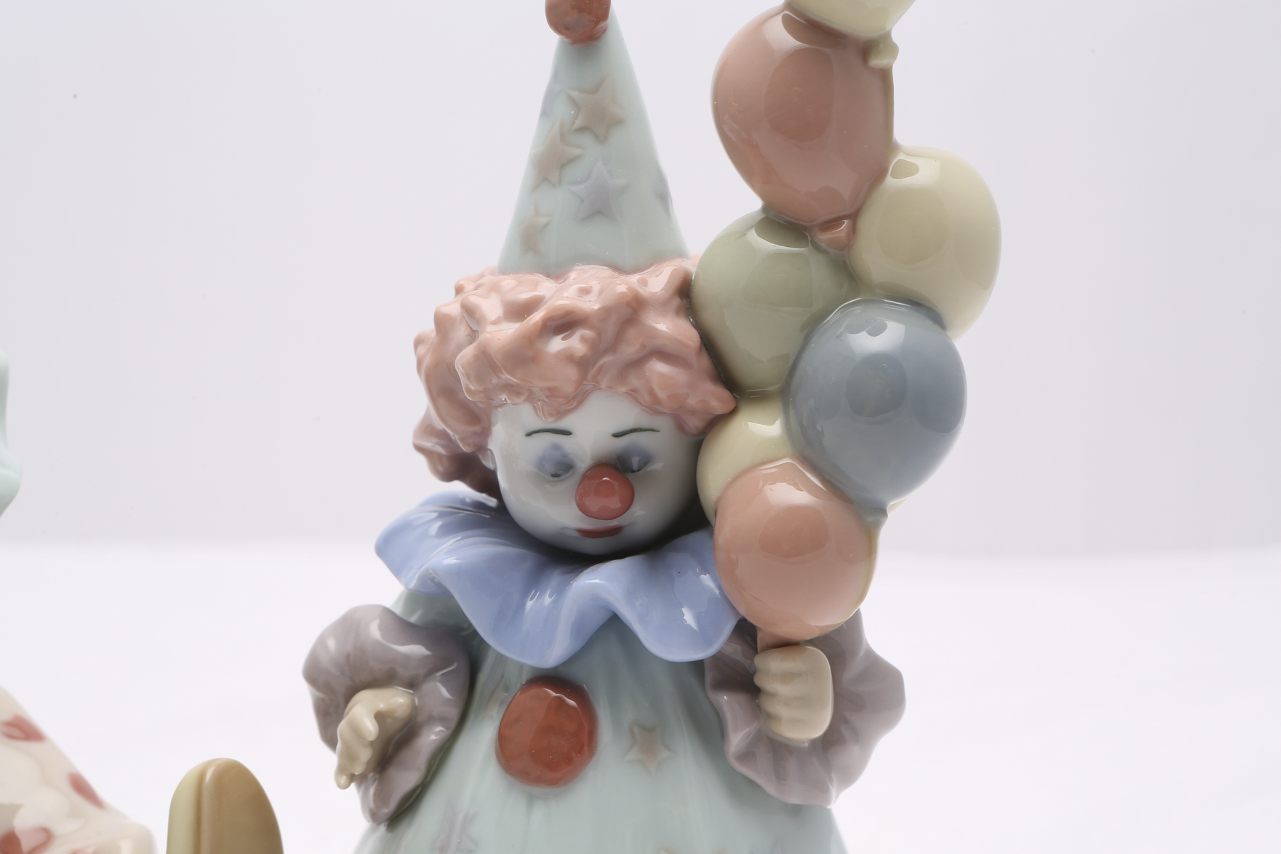 Lladró "Having a Ball" #5813 and "Littlest Clown" #5811 Figurines