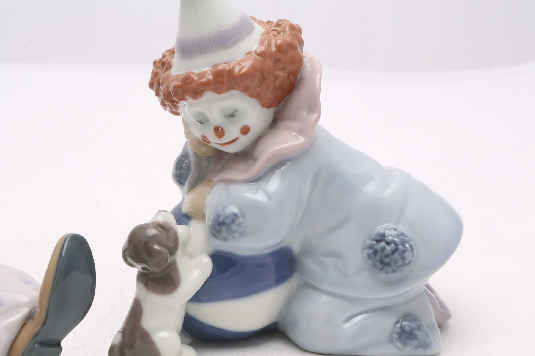 Lladró "Pierrot with Puppy and Ball" and "Tired Friend" Figurines