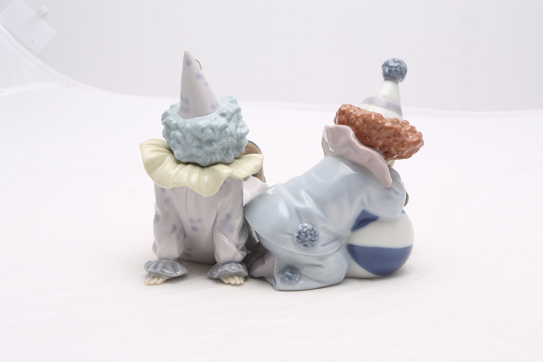 Lladró "Pierrot with Puppy and Ball" and "Tired Friend" Figurines