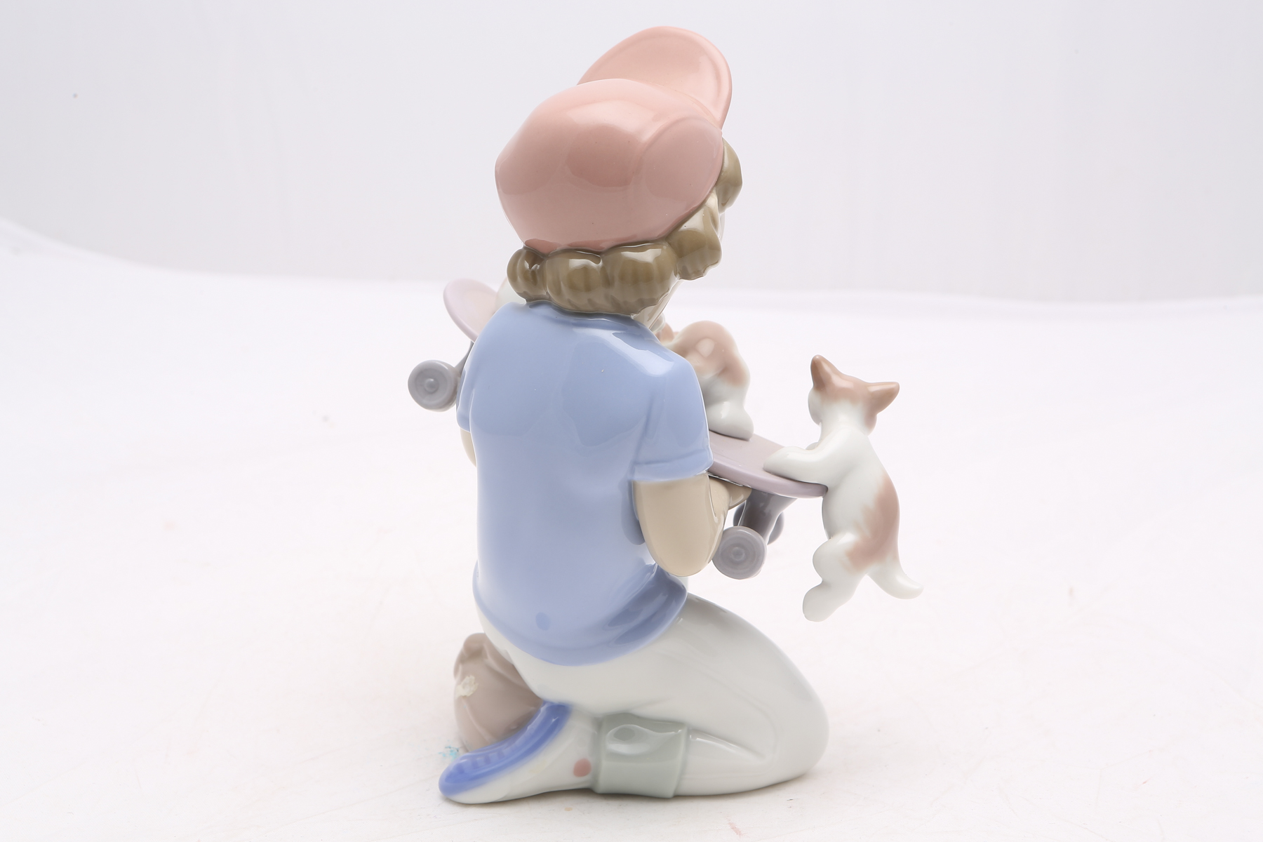 Lladró "Little Riders Boy with Skateboard" Event Figurine #7623