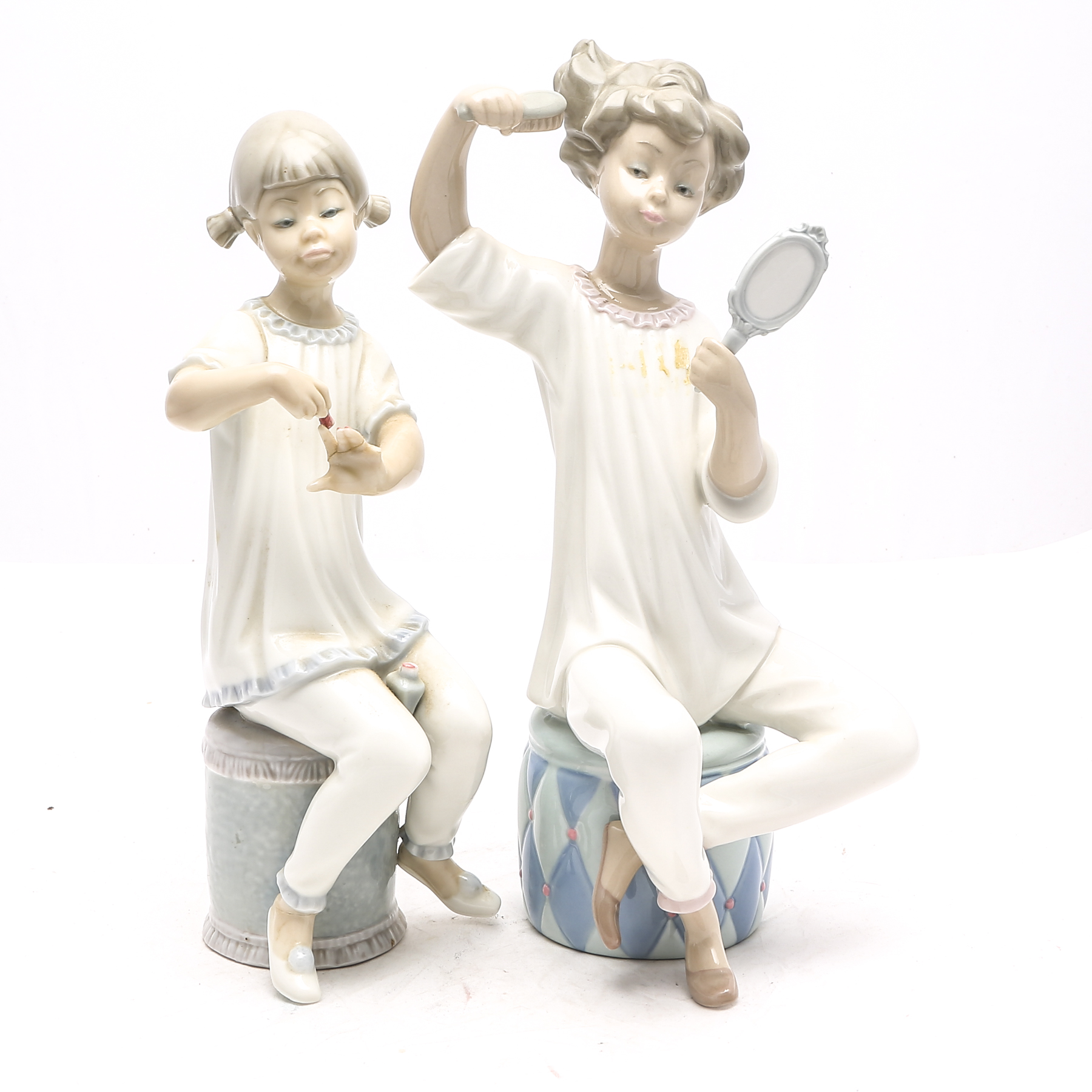 Lladró "Girl with Brush" #1081 and "Girl Manicuring" #1082
