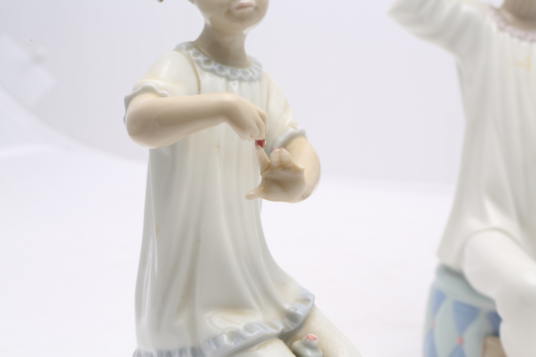 Lladró "Girl with Brush" #1081 and "Girl Manicuring" #1082