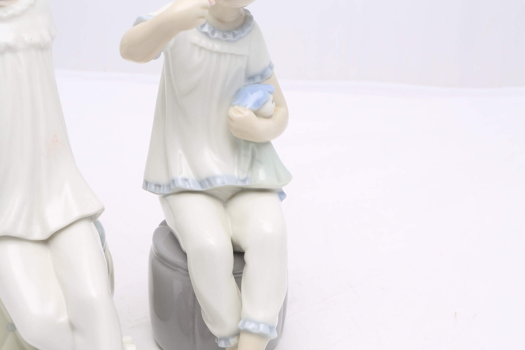 Lladró "Girl with Doll" #1083 and "Girl With Mother's Shoe" #1084