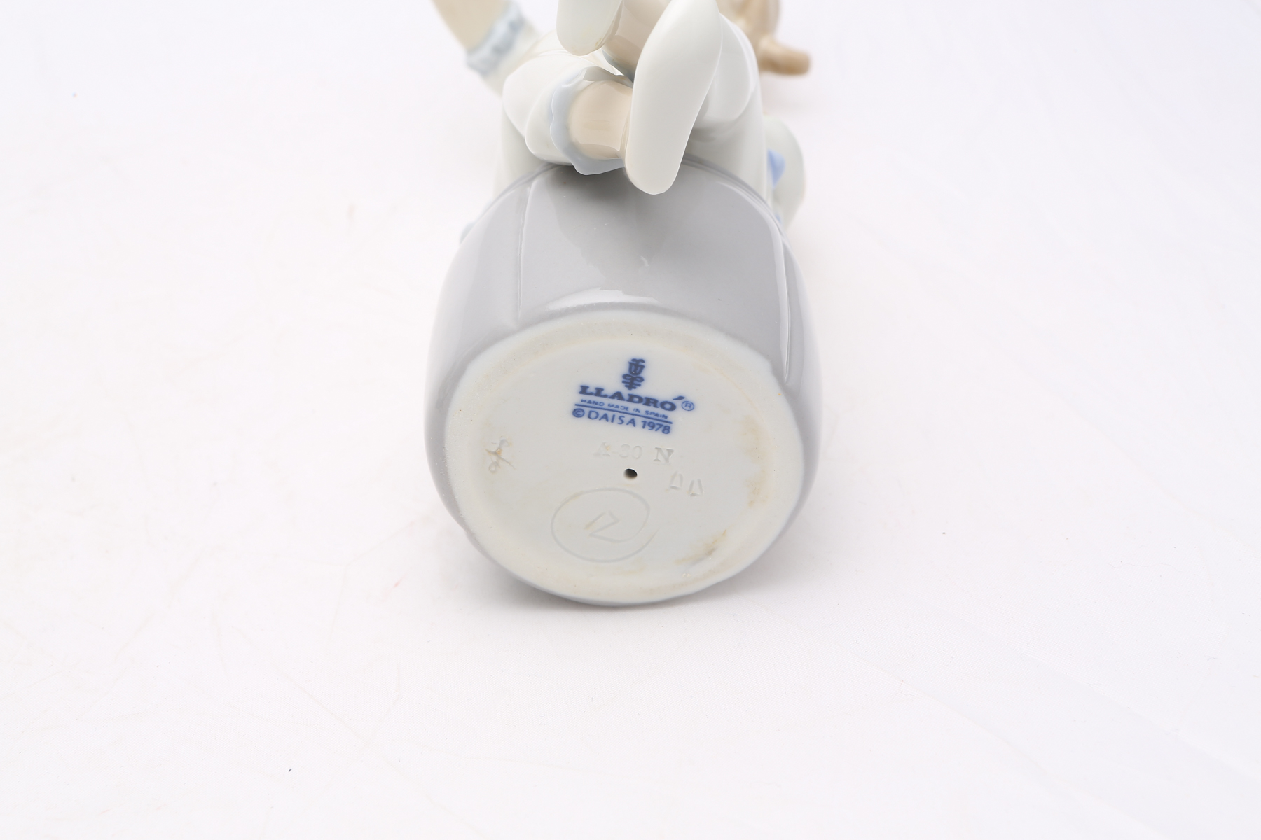 Lladró "Girl with Doll" #1083 and "Girl With Mother's Shoe" #1084