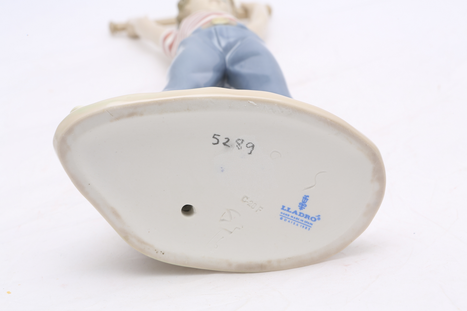 Lladró "Little Leaguer Exercising" Figurine #5289