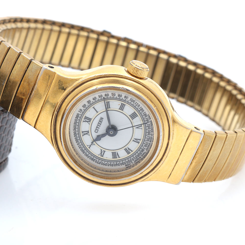 Pair of Citizen and "Goofy" Lorus Stainless Steel and Gold Tone Watches