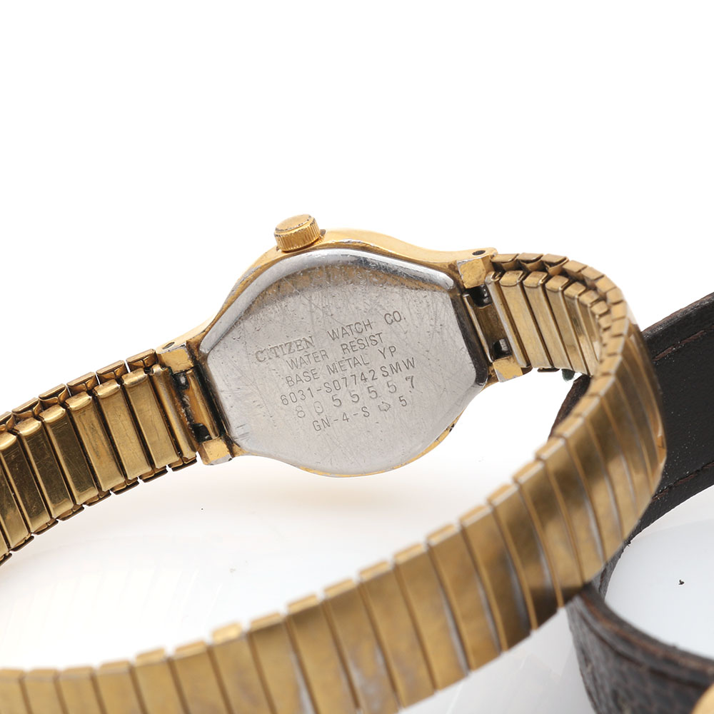 Pair of Citizen and "Goofy" Lorus Stainless Steel and Gold Tone Watches