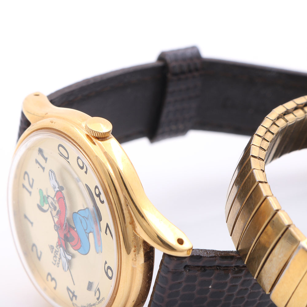 Pair of Citizen and "Goofy" Lorus Stainless Steel and Gold Tone Watches