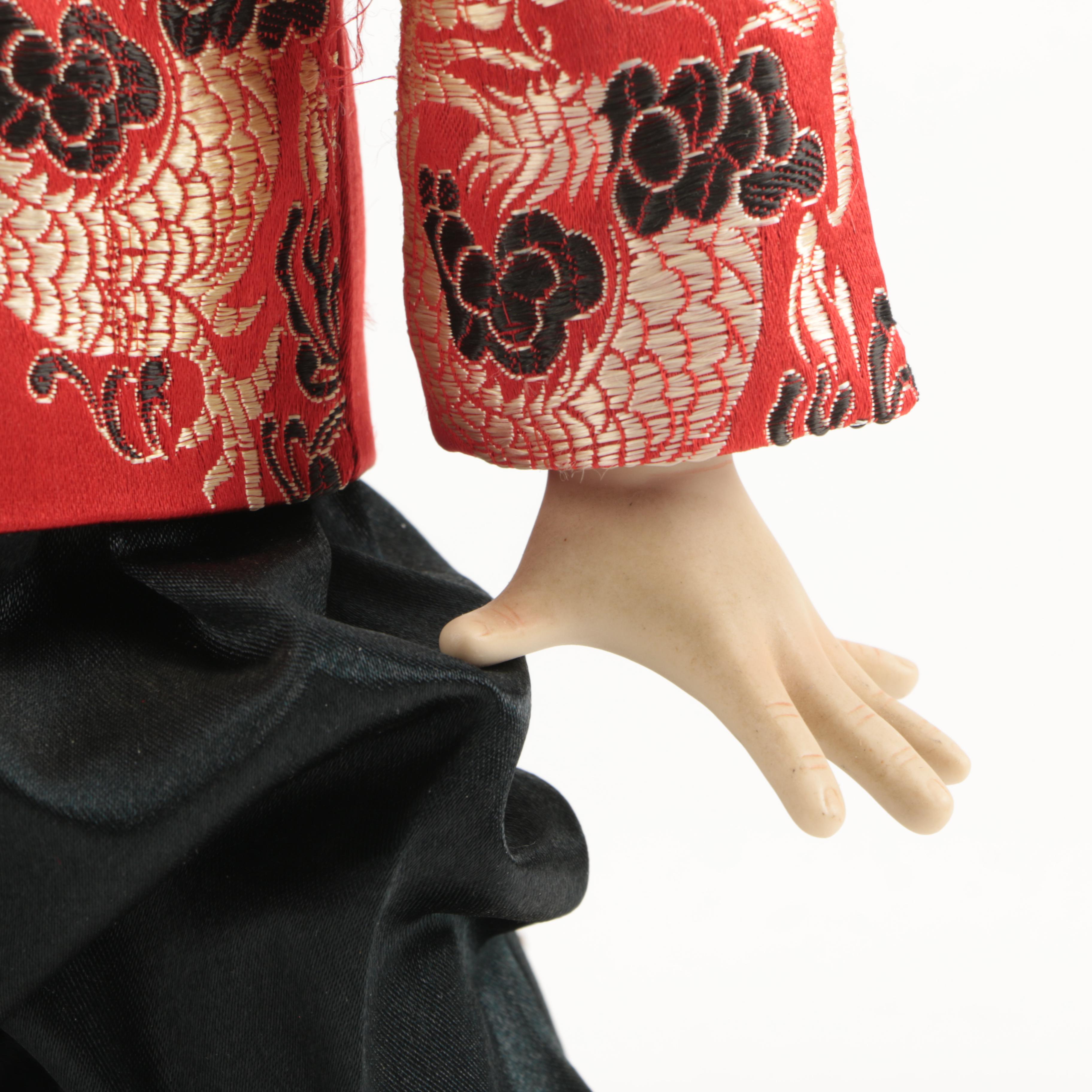 Two Japanese Ceramic Figurines