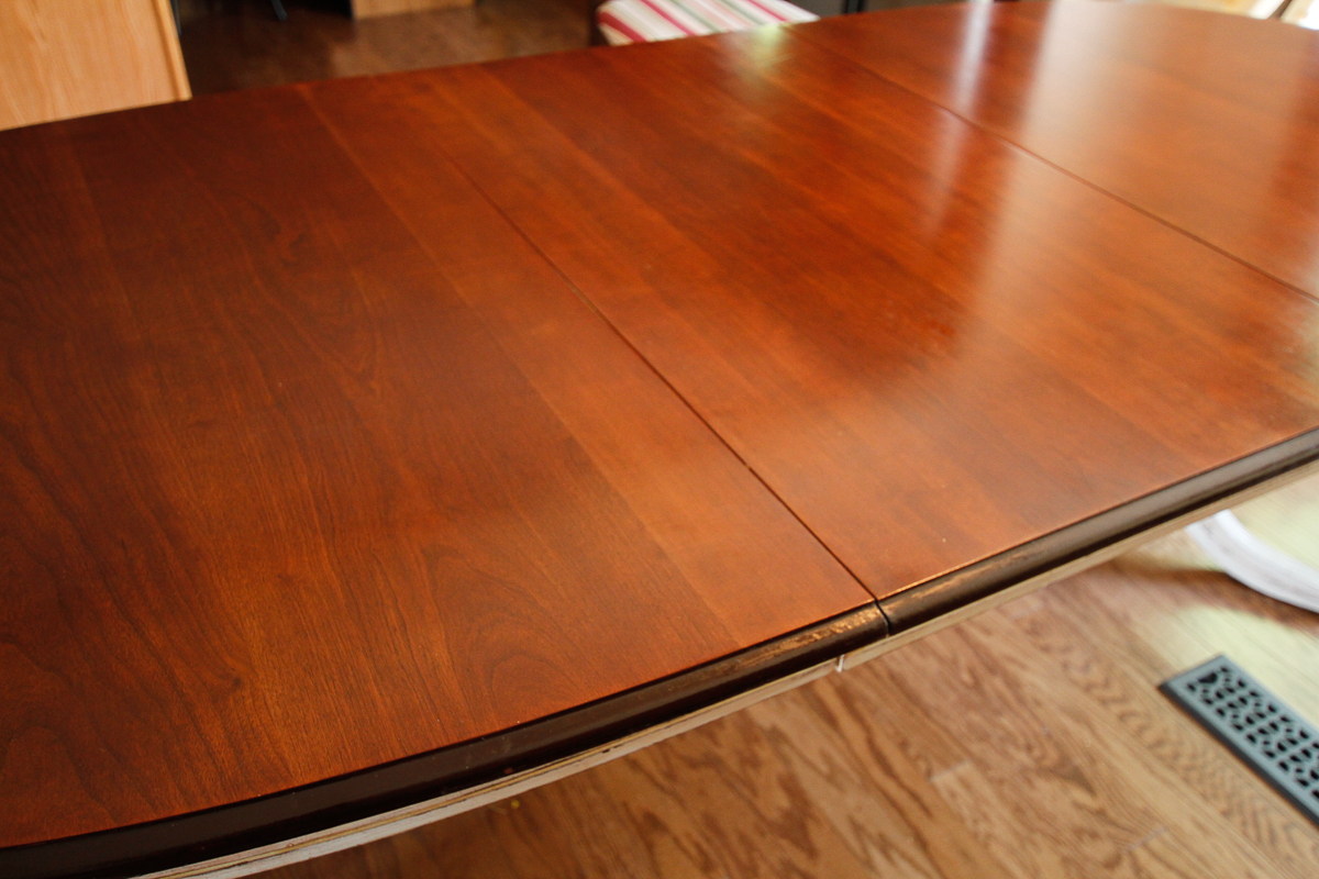 Oval Dining Table With Cherry-Stained Top and Painted Base