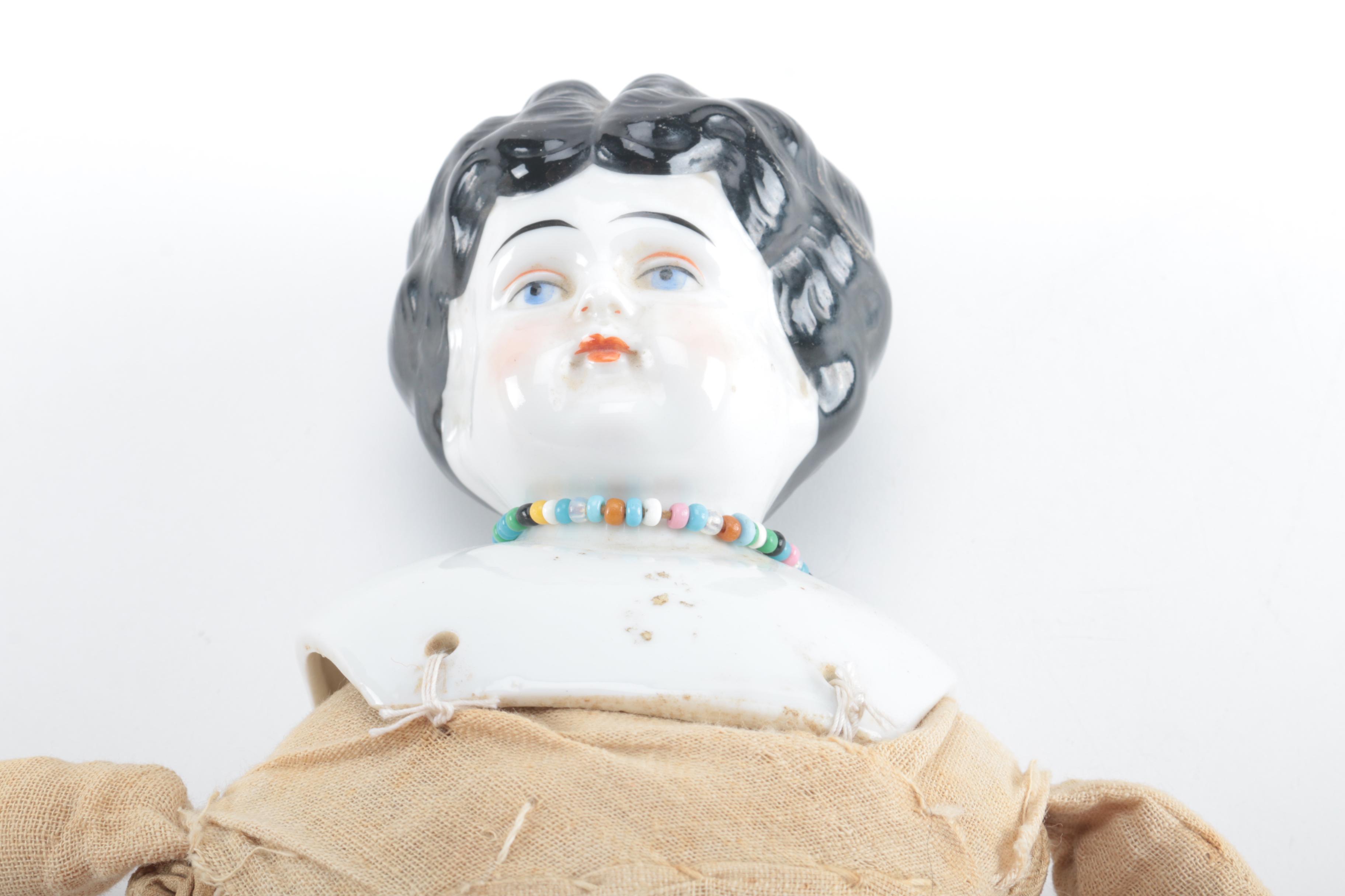 Two Antique China Head Dolls Including a German Doll