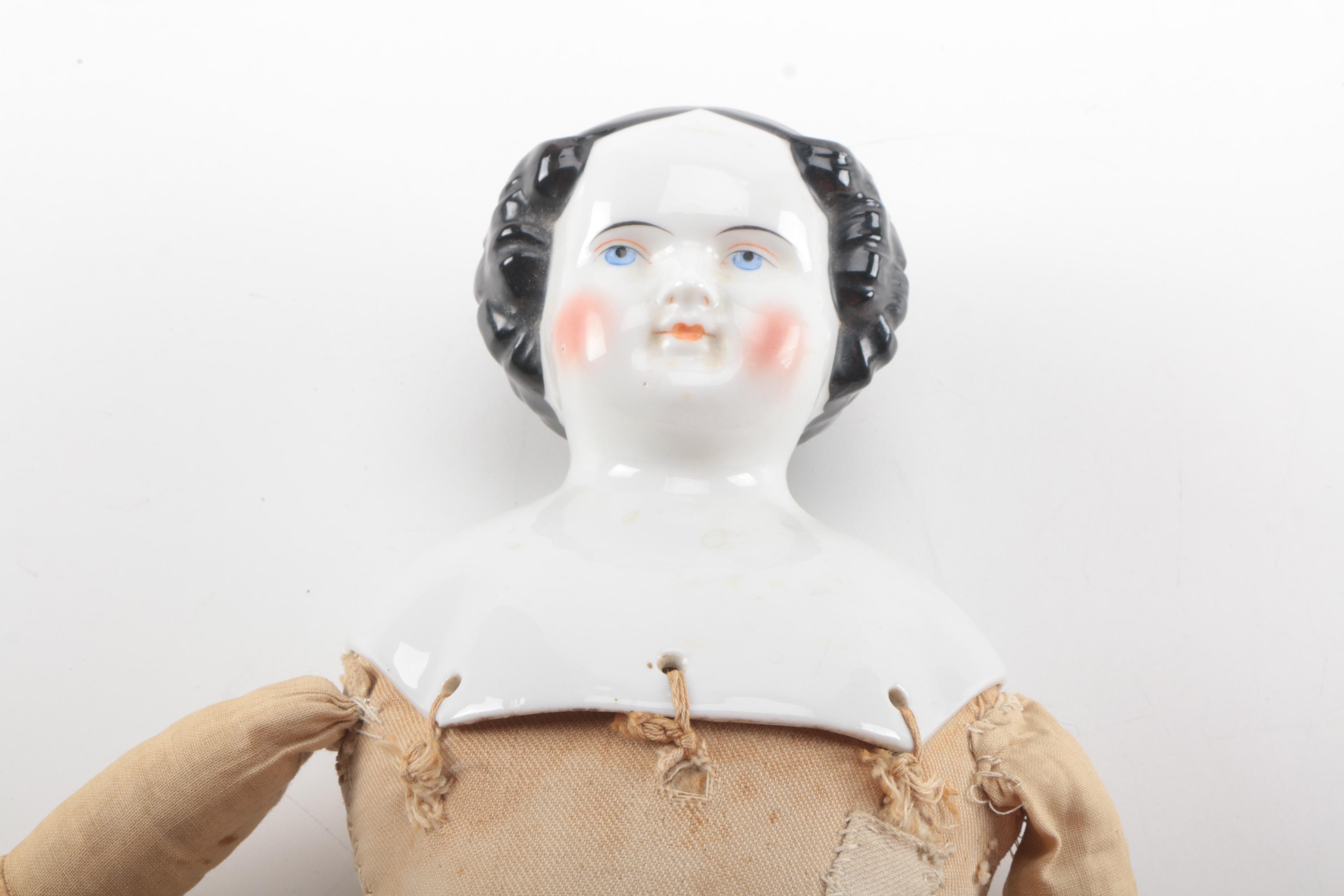 Two Antique China Head Dolls Including a German Doll