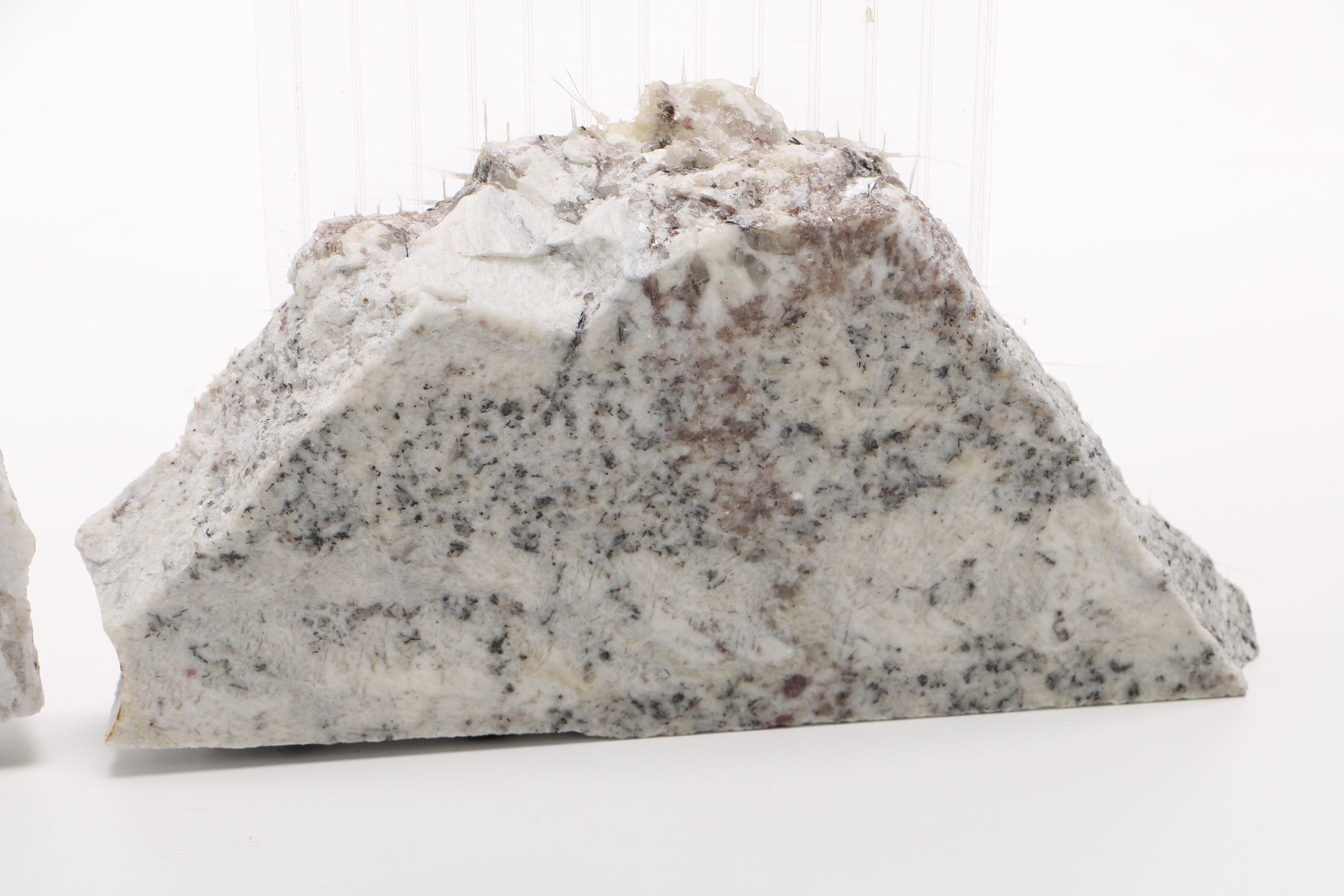 Corrugated Acrylic Shard and Gray Granite Sculptures