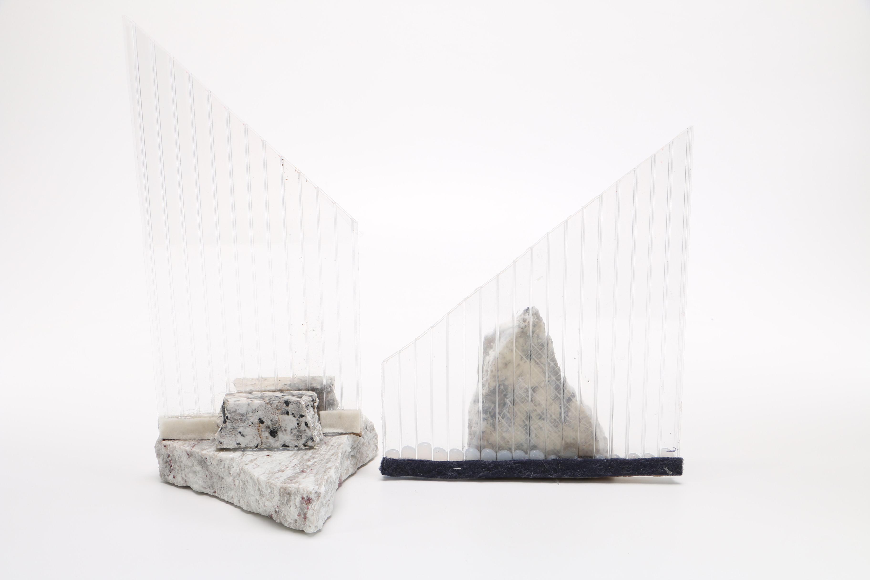 Corrugated Acrylic Shard and Gray Granite Sculptures