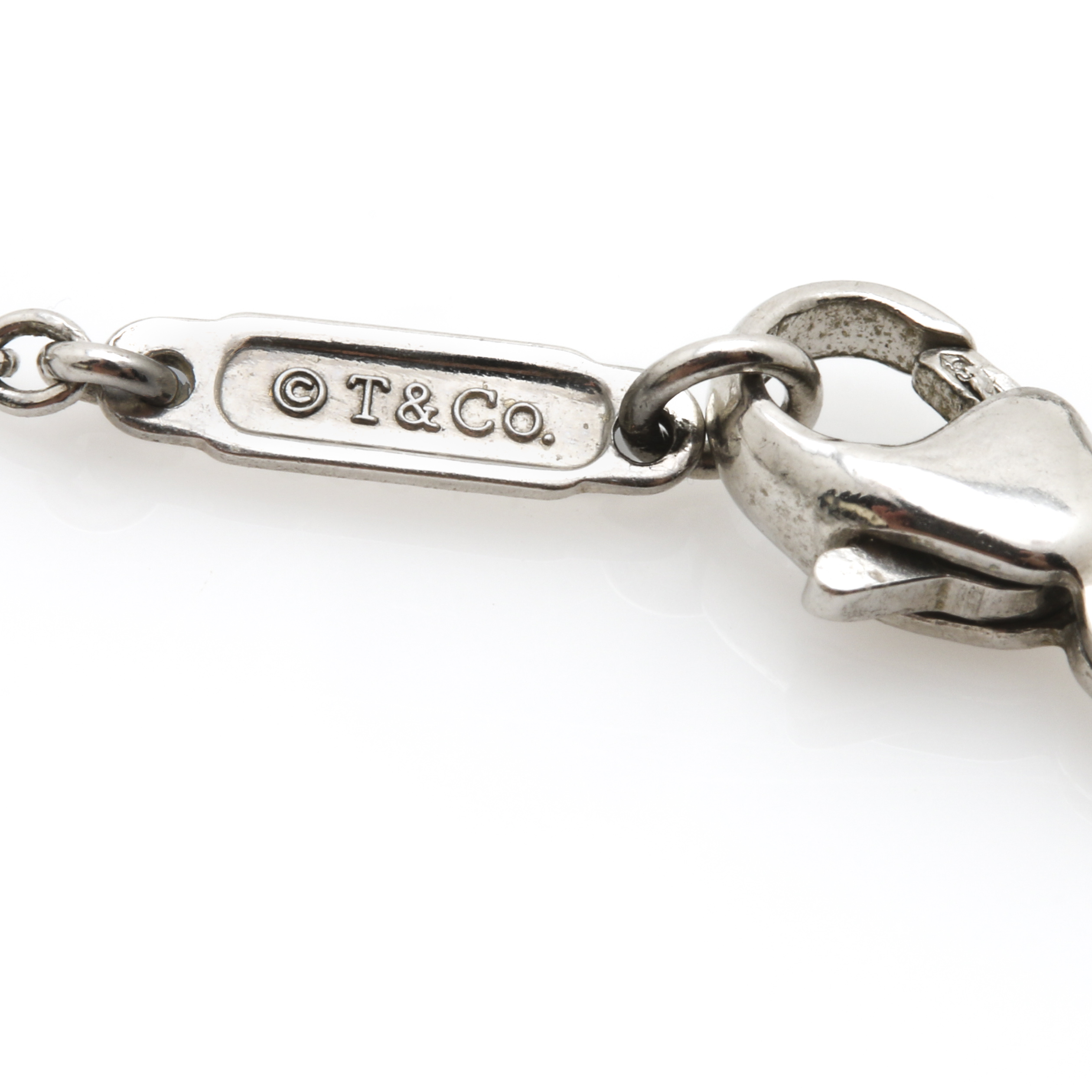 Tiffany & Co. Platinum, Onyx, and 4.46 CTW Diamond Square Key Necklace