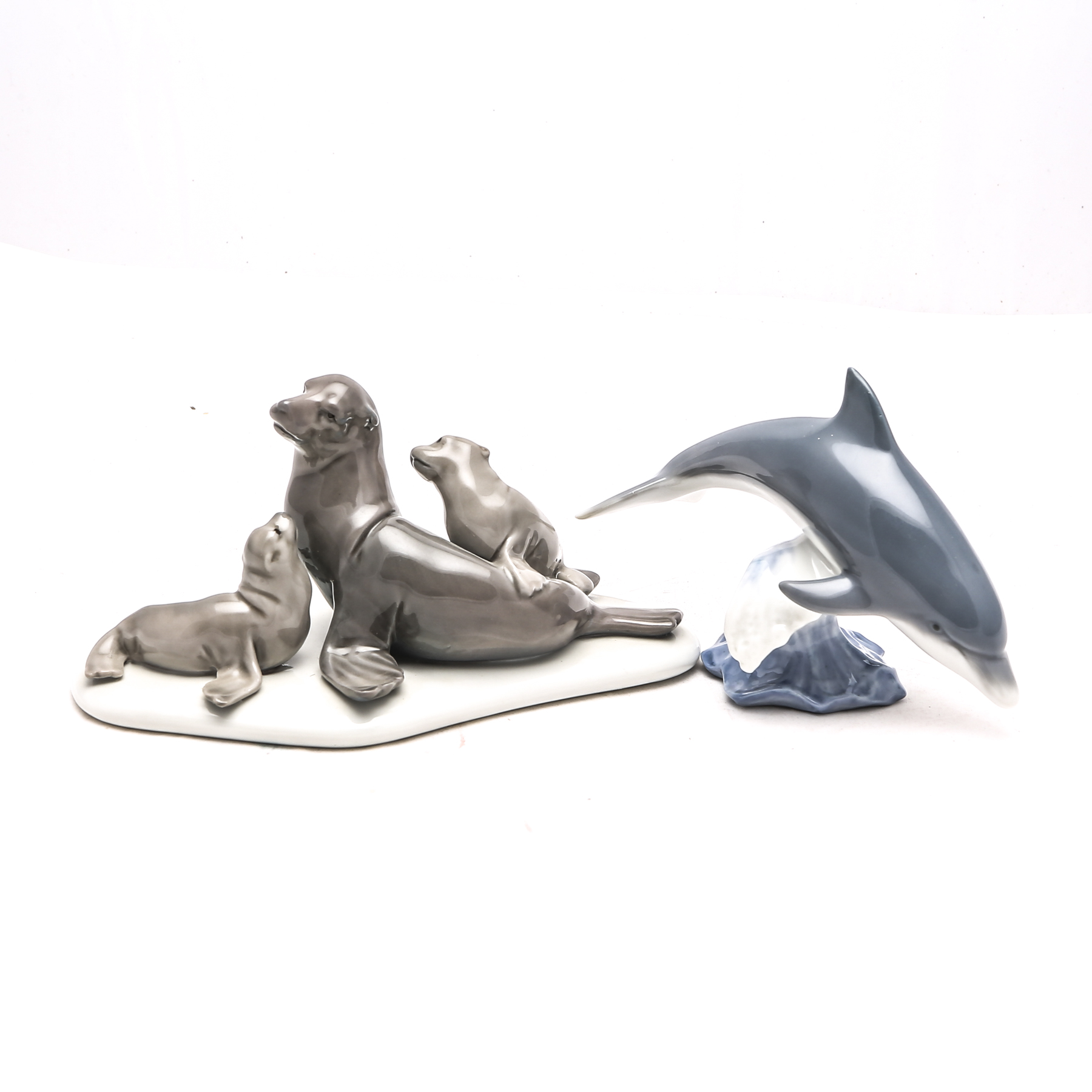 Lladró "Mini Seal Family" #5318 and "Lucky Dolphin" #8104