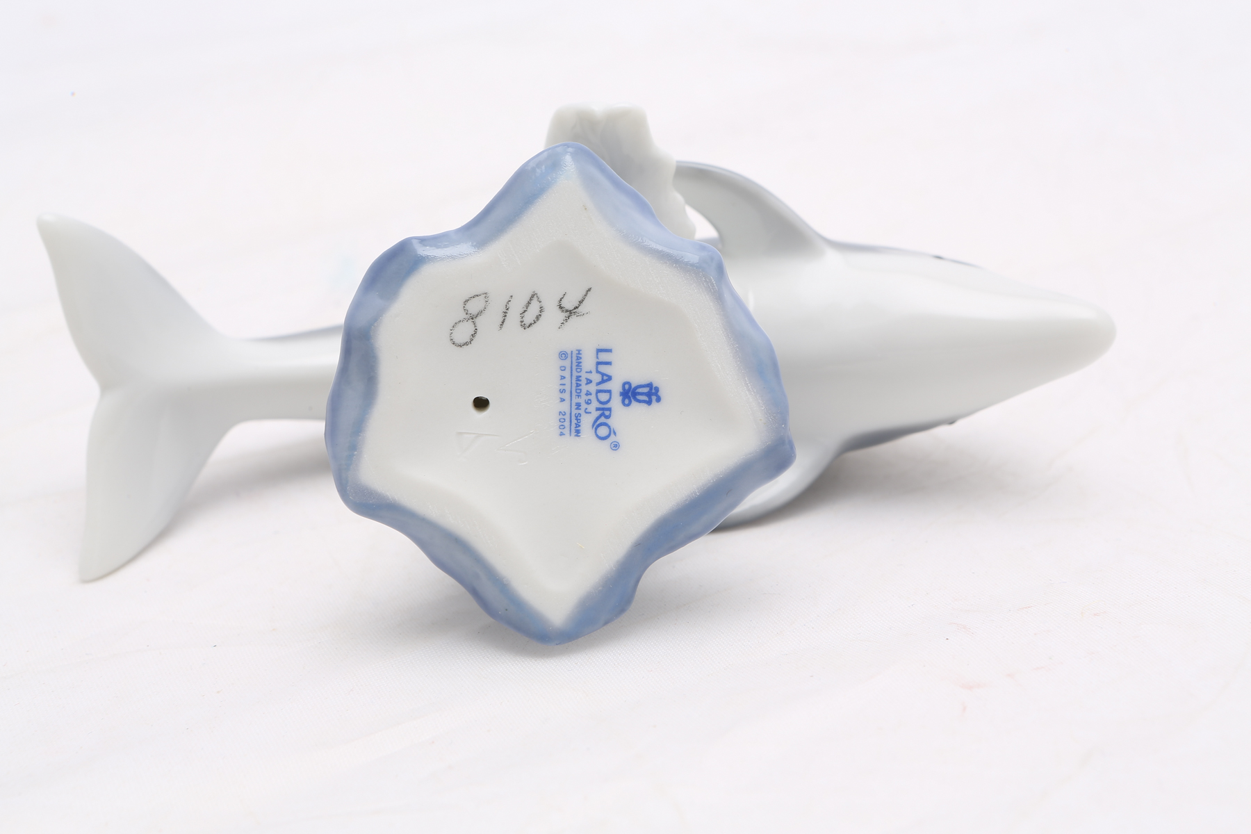 Lladró "Mini Seal Family" #5318 and "Lucky Dolphin" #8104