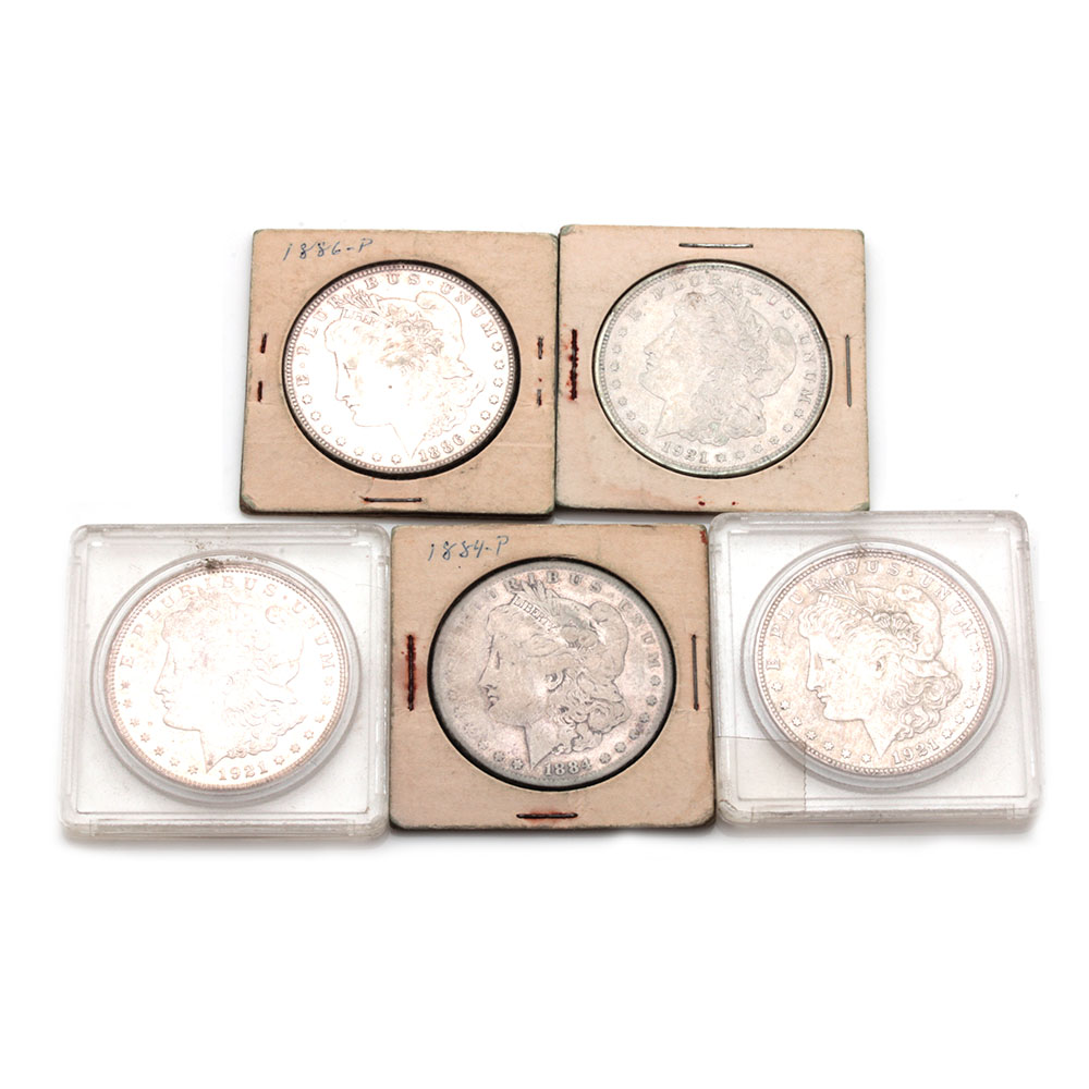 Group of Five Silver Morgan Dollars Including the Following: 1884, 1886, and three 1921