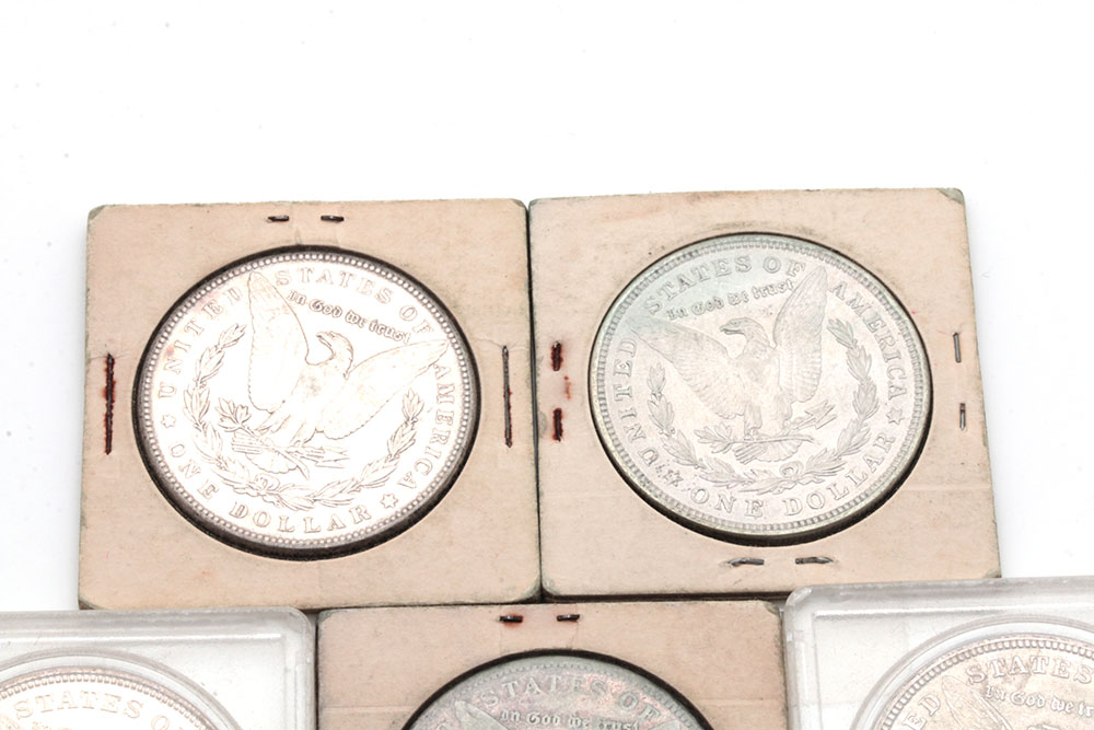 Group of Five Silver Morgan Dollars Including the Following: 1884, 1886, and three 1921